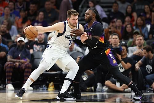 Dallas Mavericks v Phoenix Suns - Game One; Luka Doncic handles against Jae Crowder