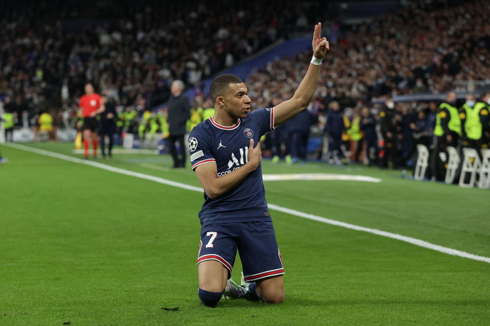 PSG's Kylian Mbappe celebrates after scoring in the UCL Round of 16 match against Real Madrid.