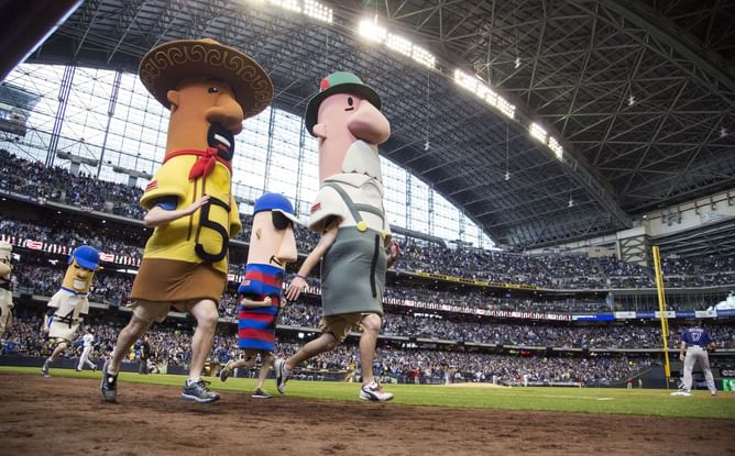 "Long live the racing sausages" - John Oliver discusses Milwaukee Brewers odd but entertaining Sausage Race on his show