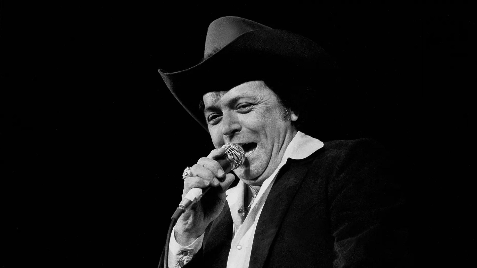 Mickey Gilley was one of the first famous country artists to open his theater in Branson, Missouri, in 1989. (Image via Getty Images/Paul Natkin)