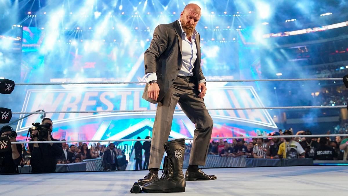 Triple H leaves his boots in the ring at WrestleMania Sunday, following his retirement announcement