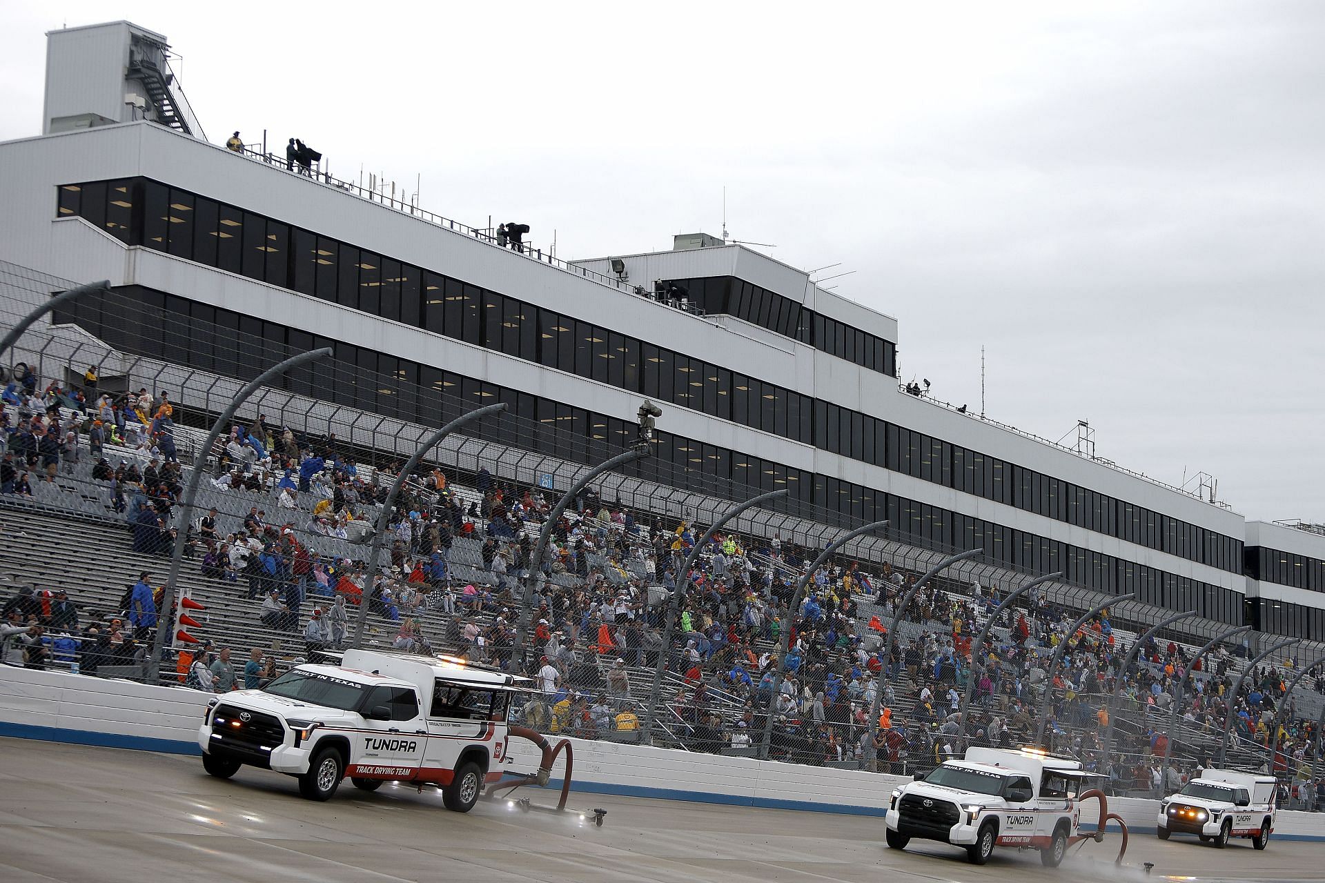 Trucks working on the asphalt during the 2022 NASCAR Cup Series DuraMAX Drydene 400 presented by RelaDyne