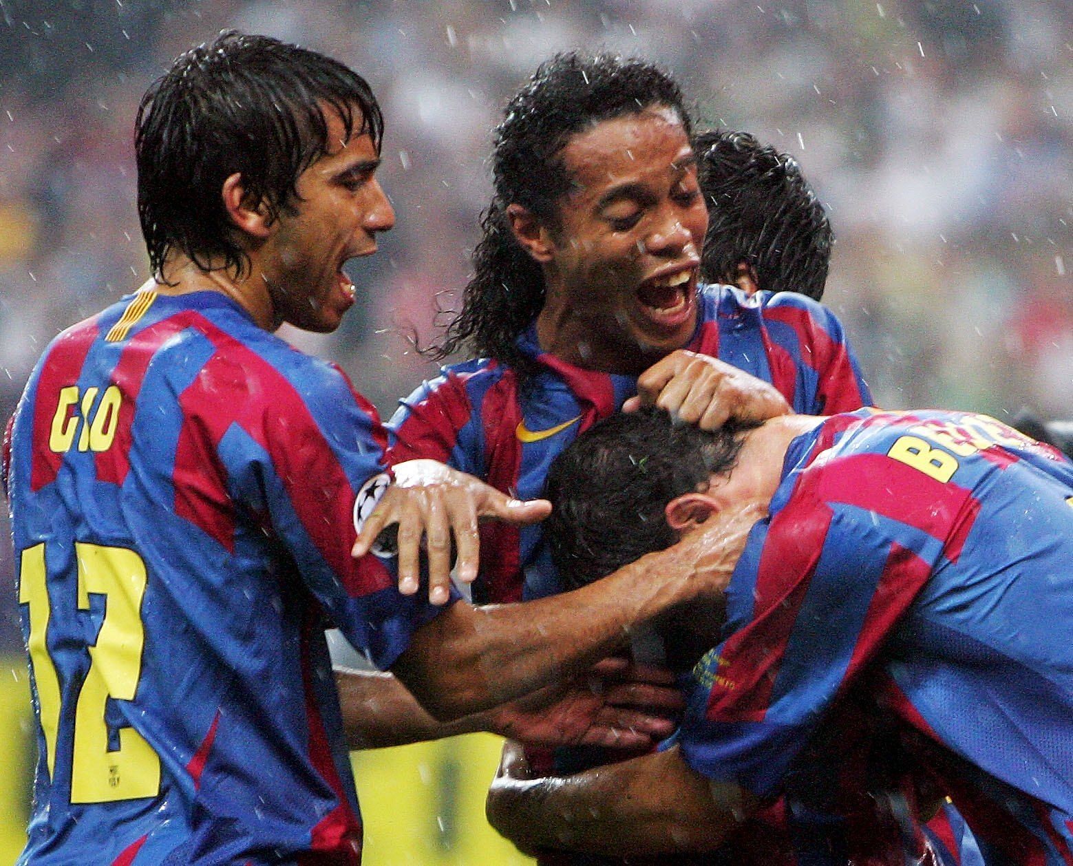 Barcelona players celebrate after scoring the winning goal