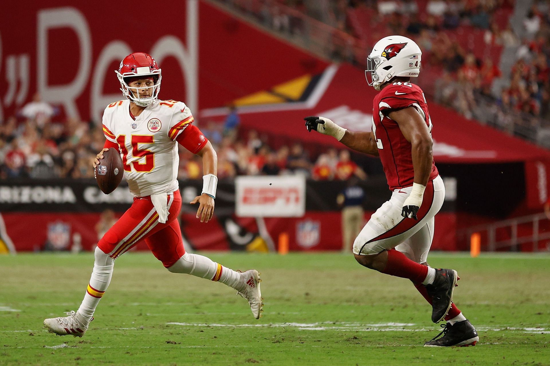 Mahomes rolls out against the Arizona Cardinals