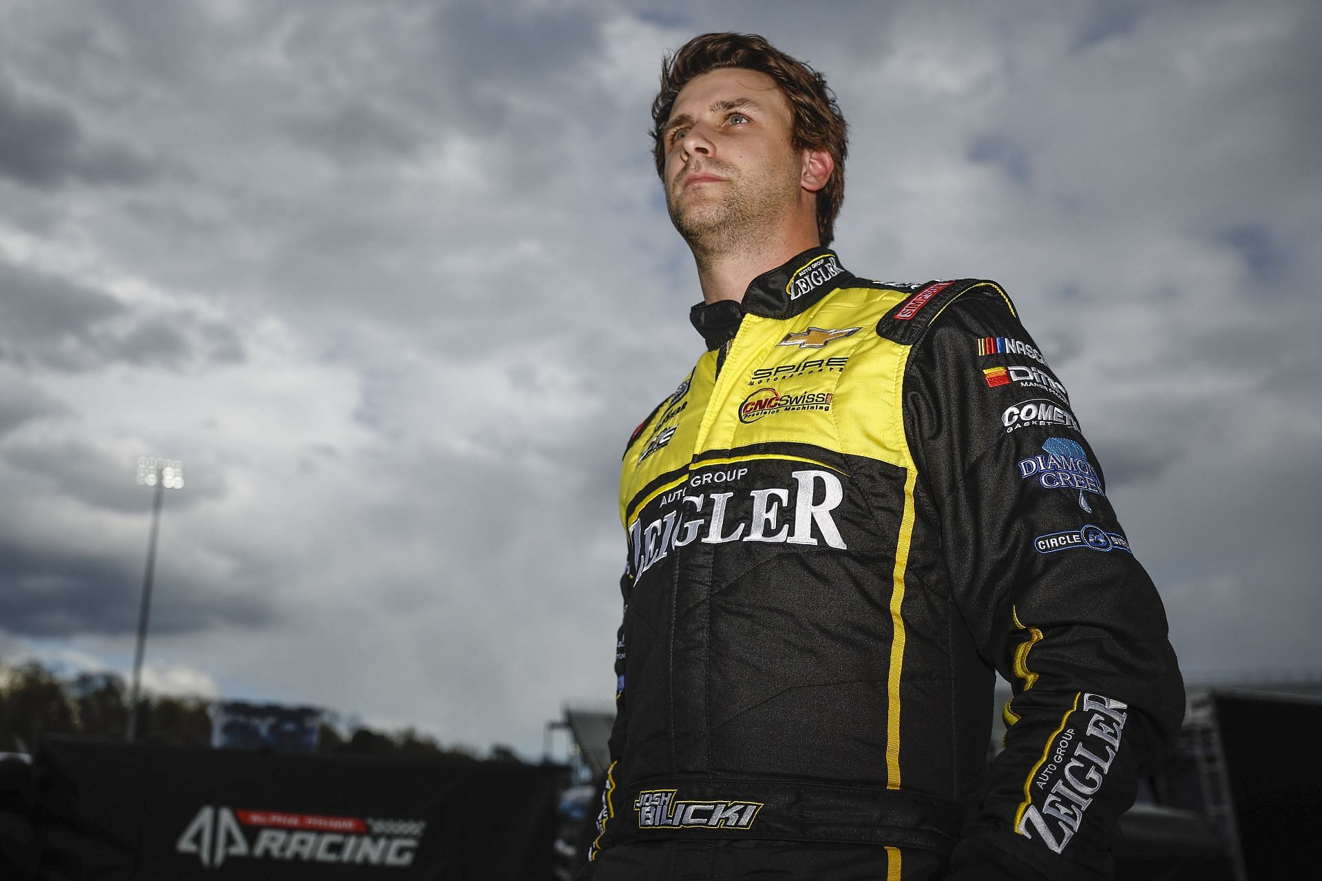 Josh Bilicki looks on during qualifying for the 2022 NASCAR Cup Series Blue-Emu Maximum Pain Relief 400 at Martinsville Speedway in Martinsville, Virginia. (Photo by Jared C. Tilton/Getty Images)