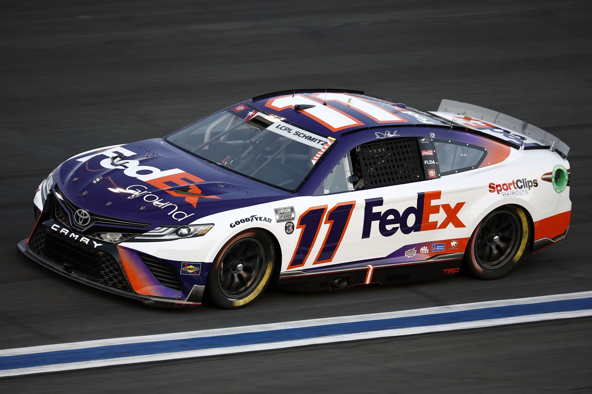 Denny Hamlin drives during qualifying for the NASCAR Cup Series Coca-Cola 600 at Charlotte Motor Speedway.