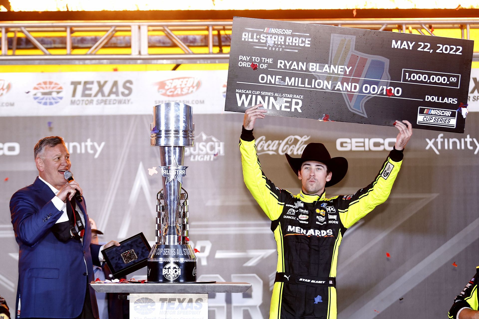 Ryan Blaney celebrates with the million dollar check in victory lane after winning the NASCAR Cup Series All-Star Race at Texas Motor Speedway (Photo by Chris Graythen/Getty Images)
