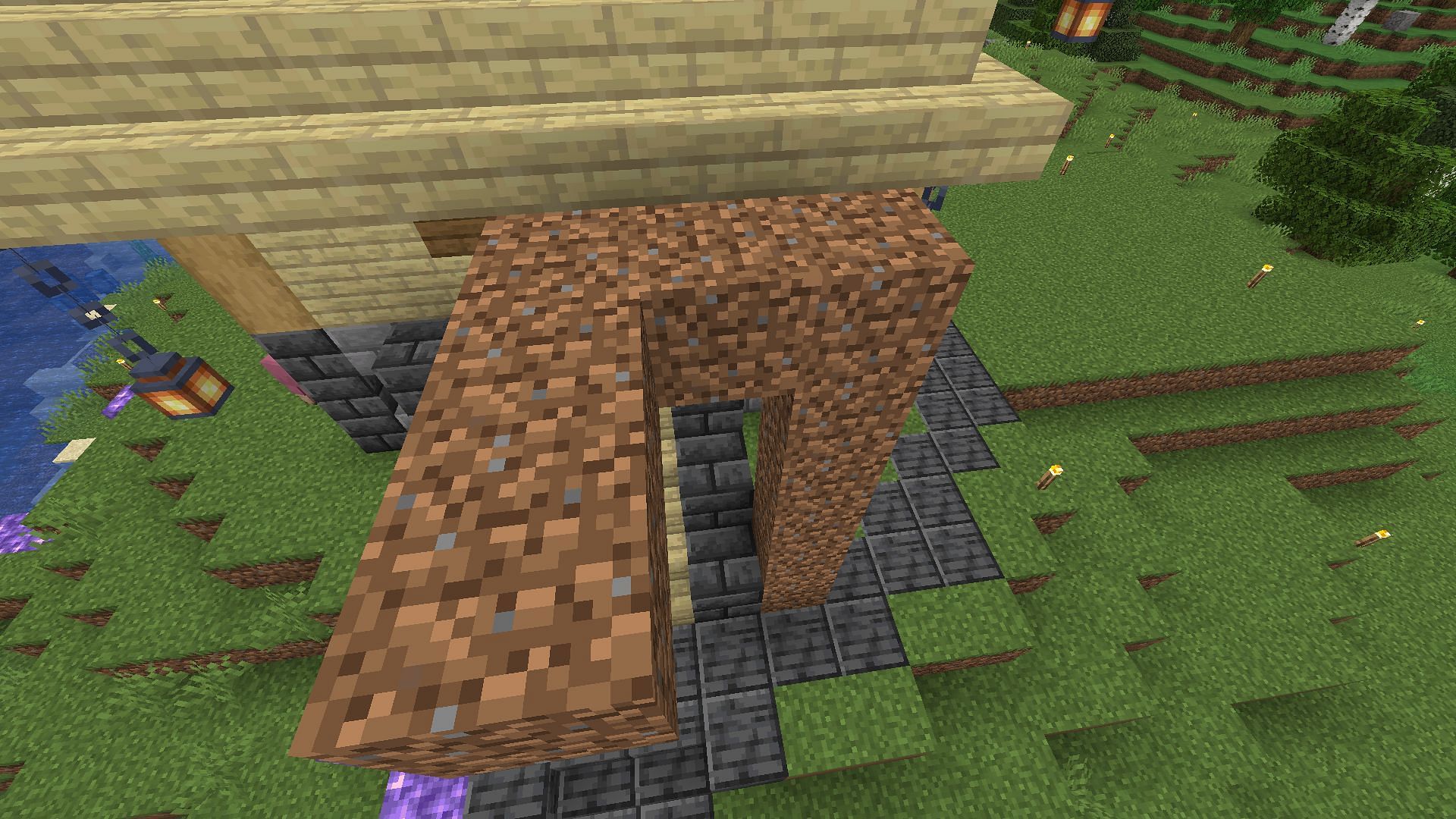 Dirt blocks used as scaffolding (Image via Minecraft)