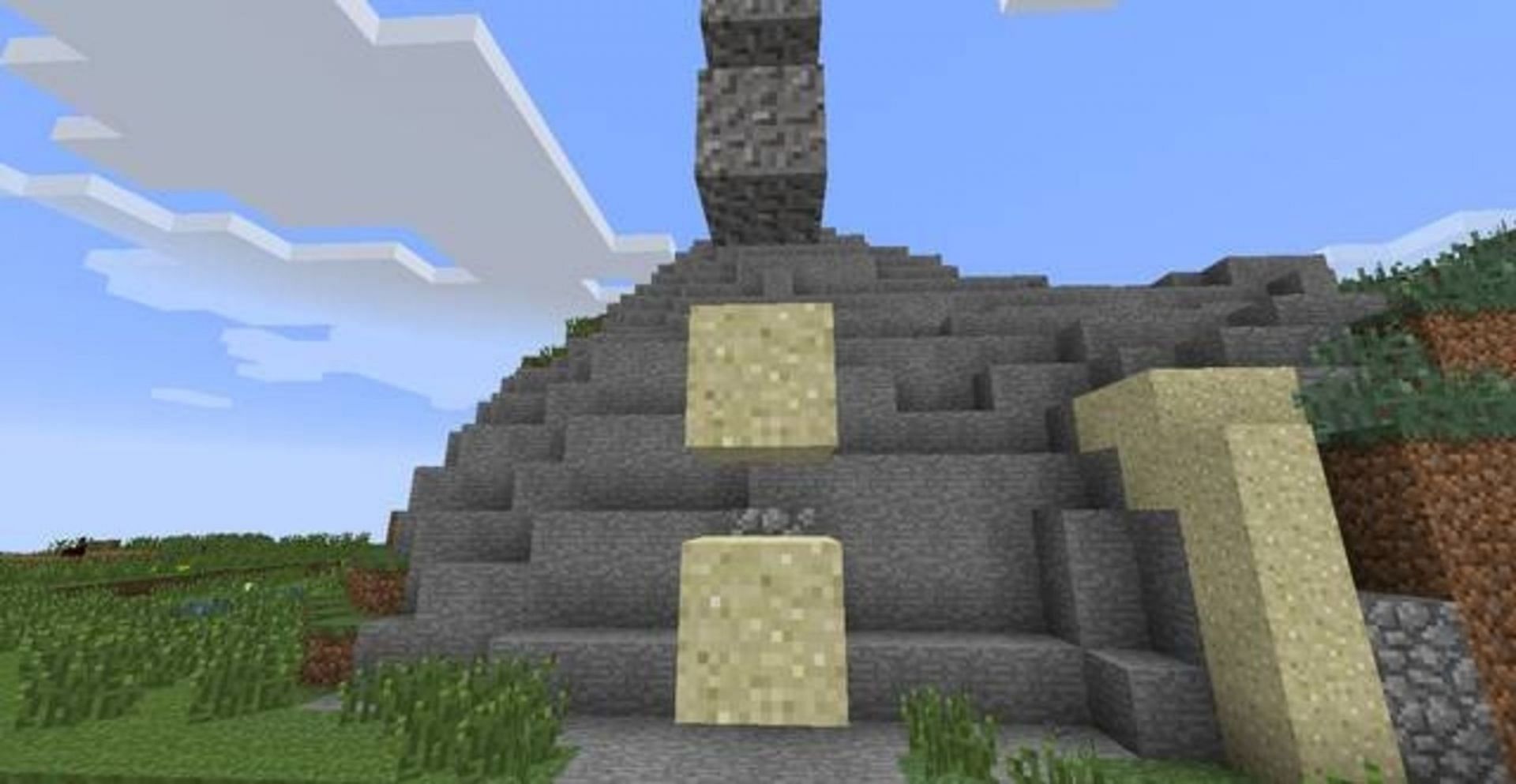 End rods can break sand and gravel much like torches (Image via Mojang)