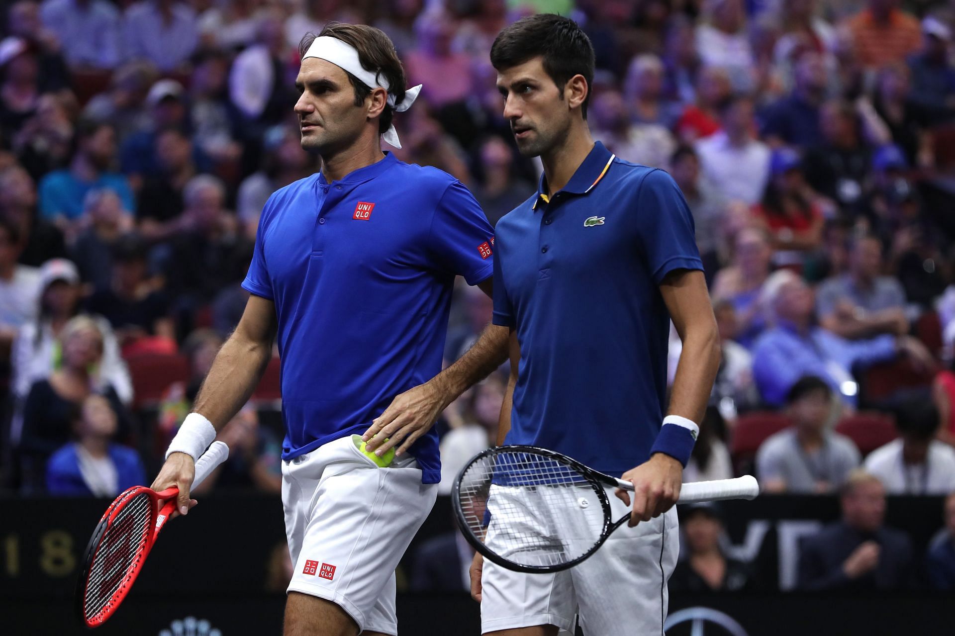 Roger Federer and Novak Djokovic playing doubles at the 2018 Laver Cup