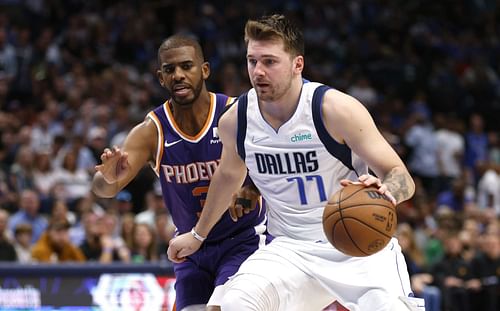 Chris Paul and Luka Doncic in action