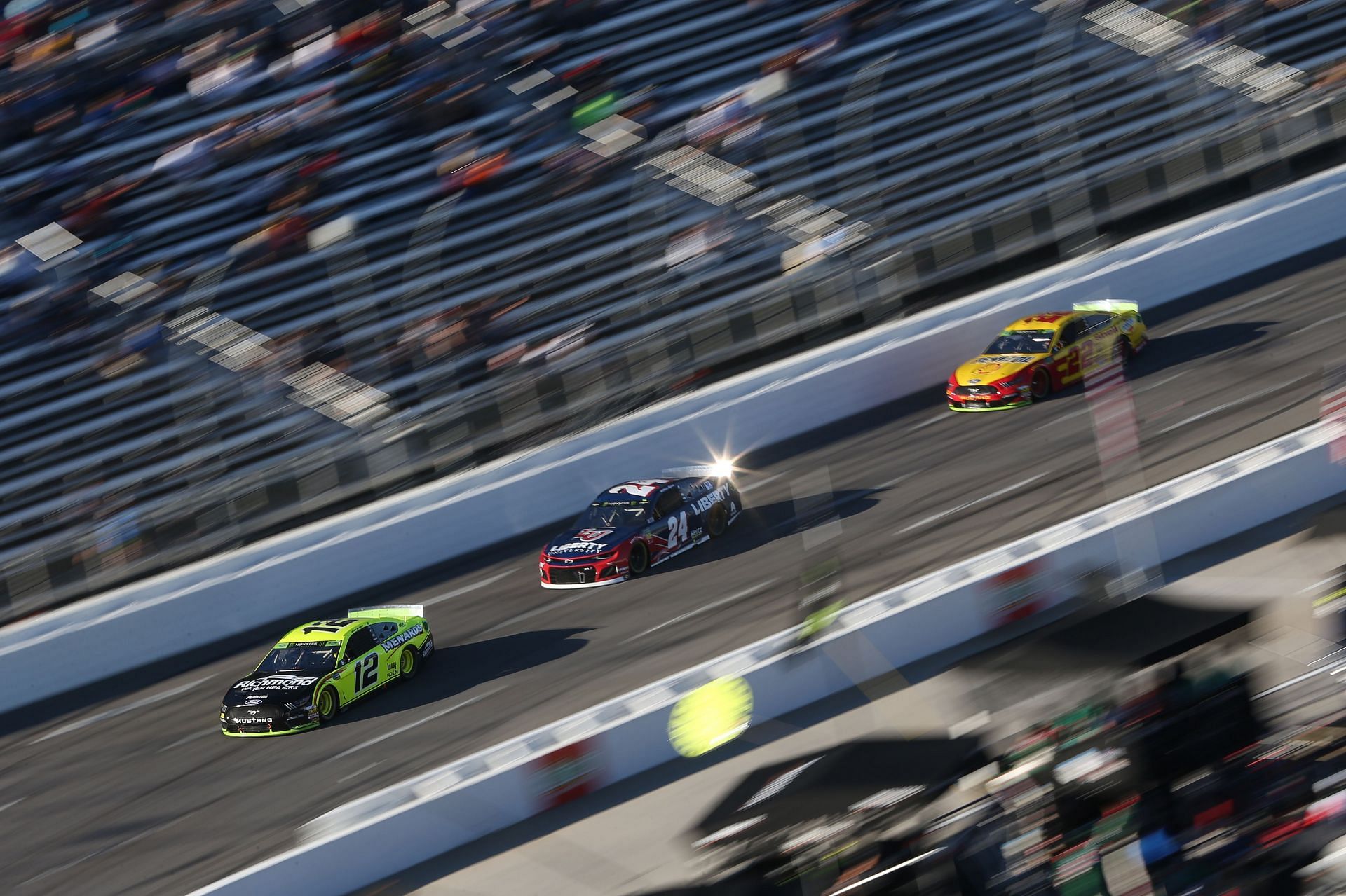Ryan Blaney leads William Byron and Joey Logano during the Monster Energy NASCAR Cup Series First Data 500 at Martinsville Speedway on October 27, 2019 (Photo by Brian Lawdermilk/Getty Images)
