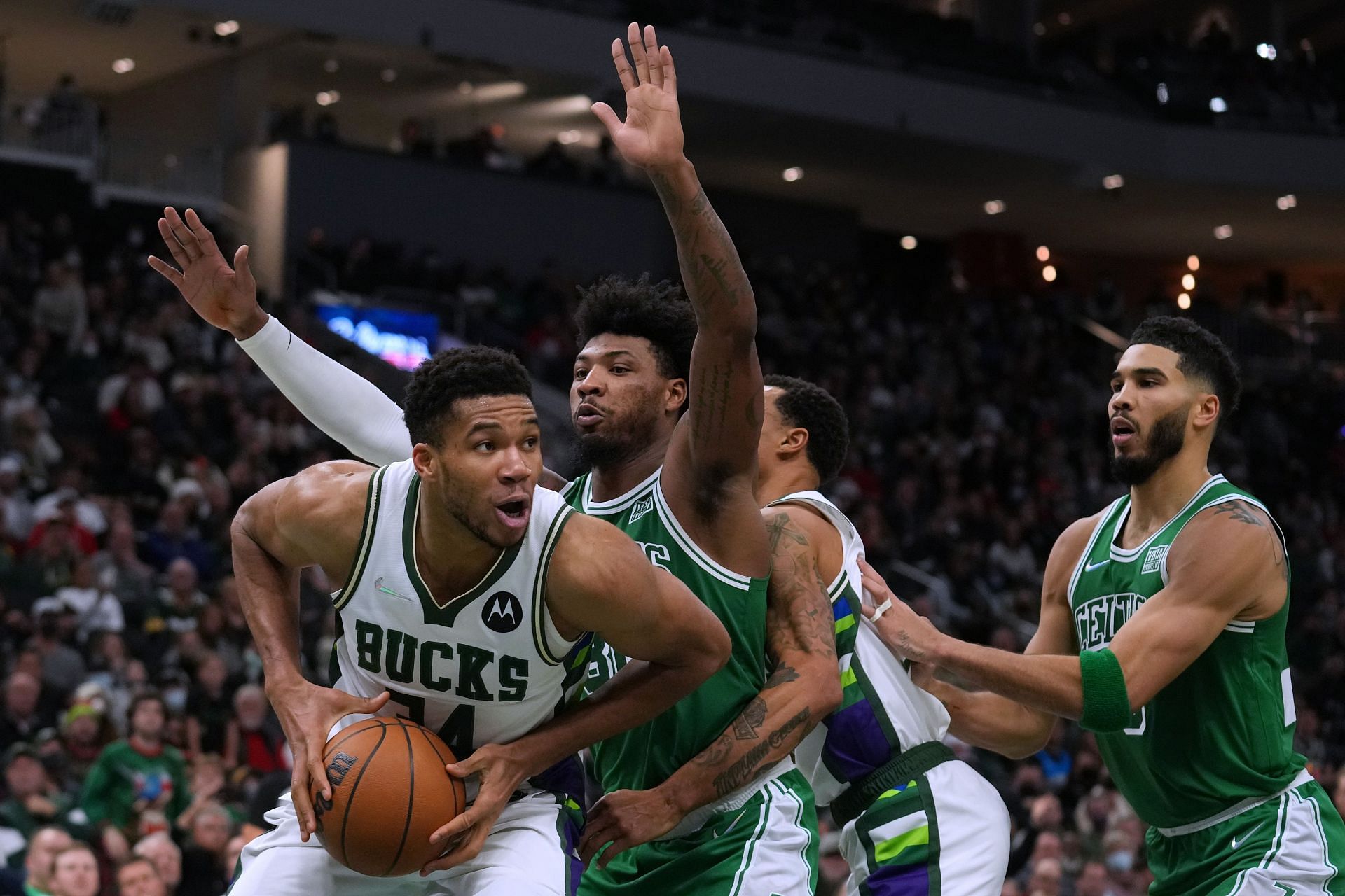 Antetokounmpo being guarded by Marcus Smart in Game One