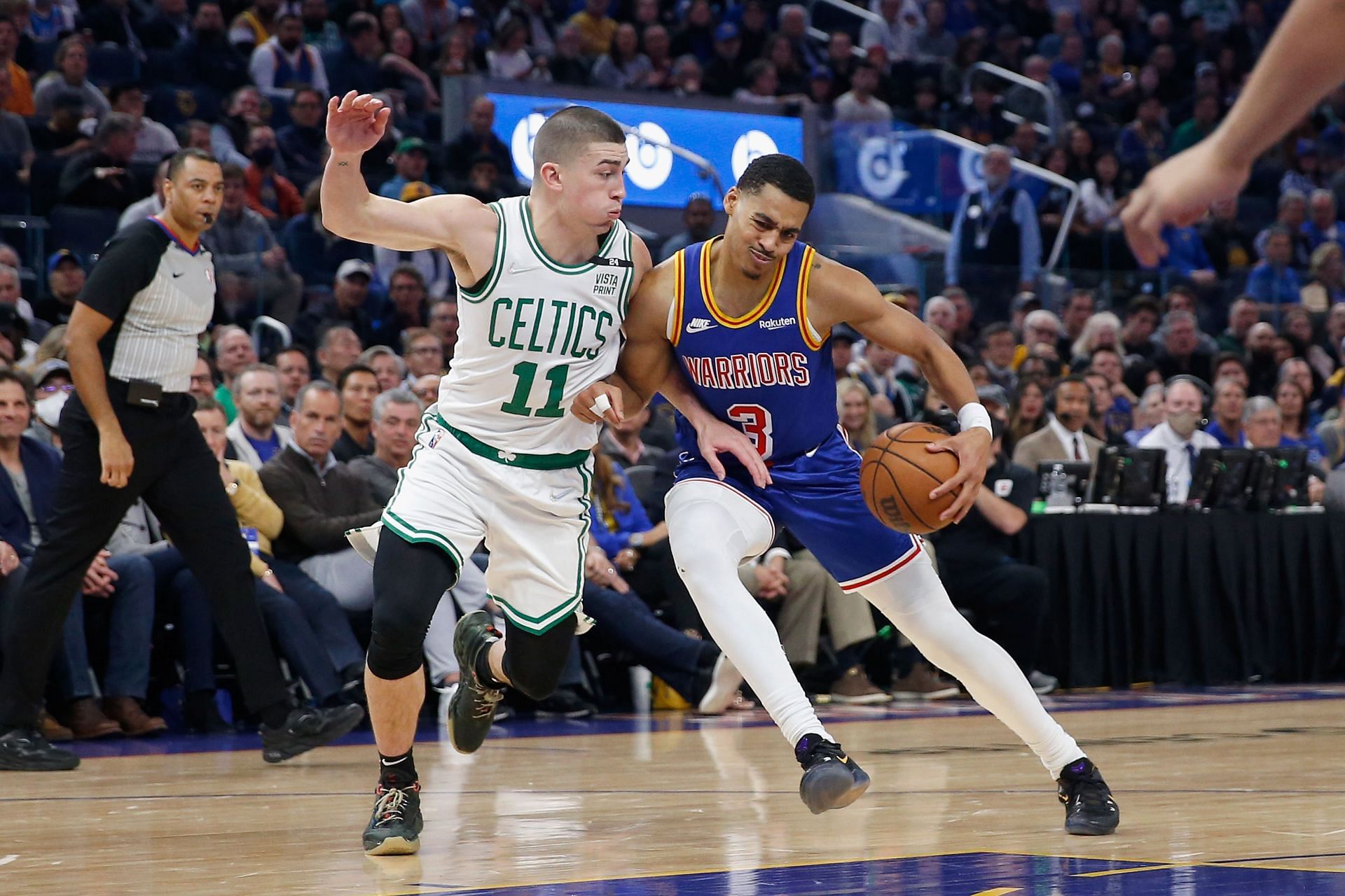 Payton Pritchard, left, and Jordan Poole, right. Golden State and Boston tied their regular-season series at one apiece.