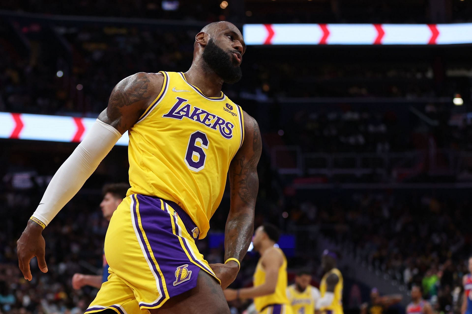 LeBron James #6 of the Los Angeles Lakers reacts after shooting a basket against the Washington Wizards during the first half at Capital One Arena on March 19, 2022 in Washington, DC.