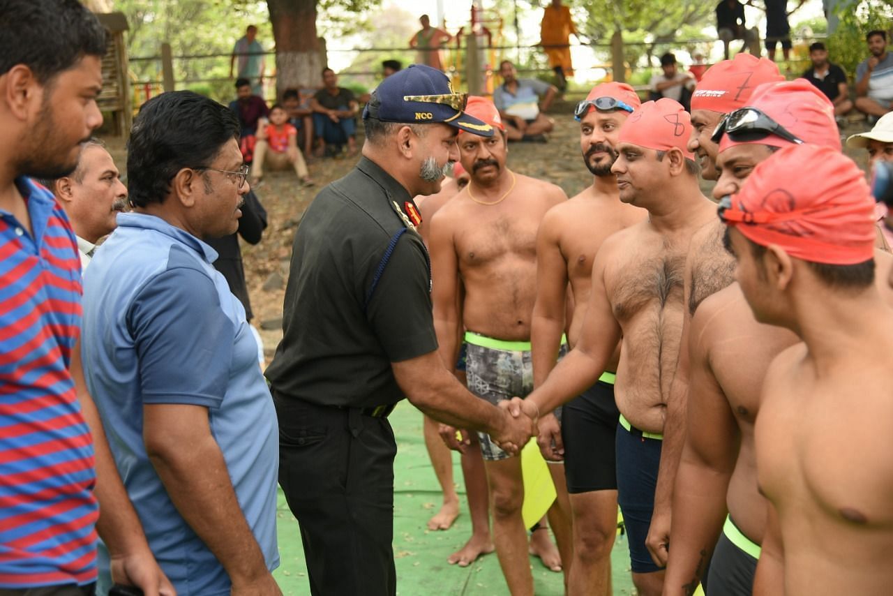 NCC Naval Unit Commanding Officer Col. Amod Chandana wishes good luck to participants at the Ambazari Lake in Nagpur. (Pic credits: JD Sports Foundation)