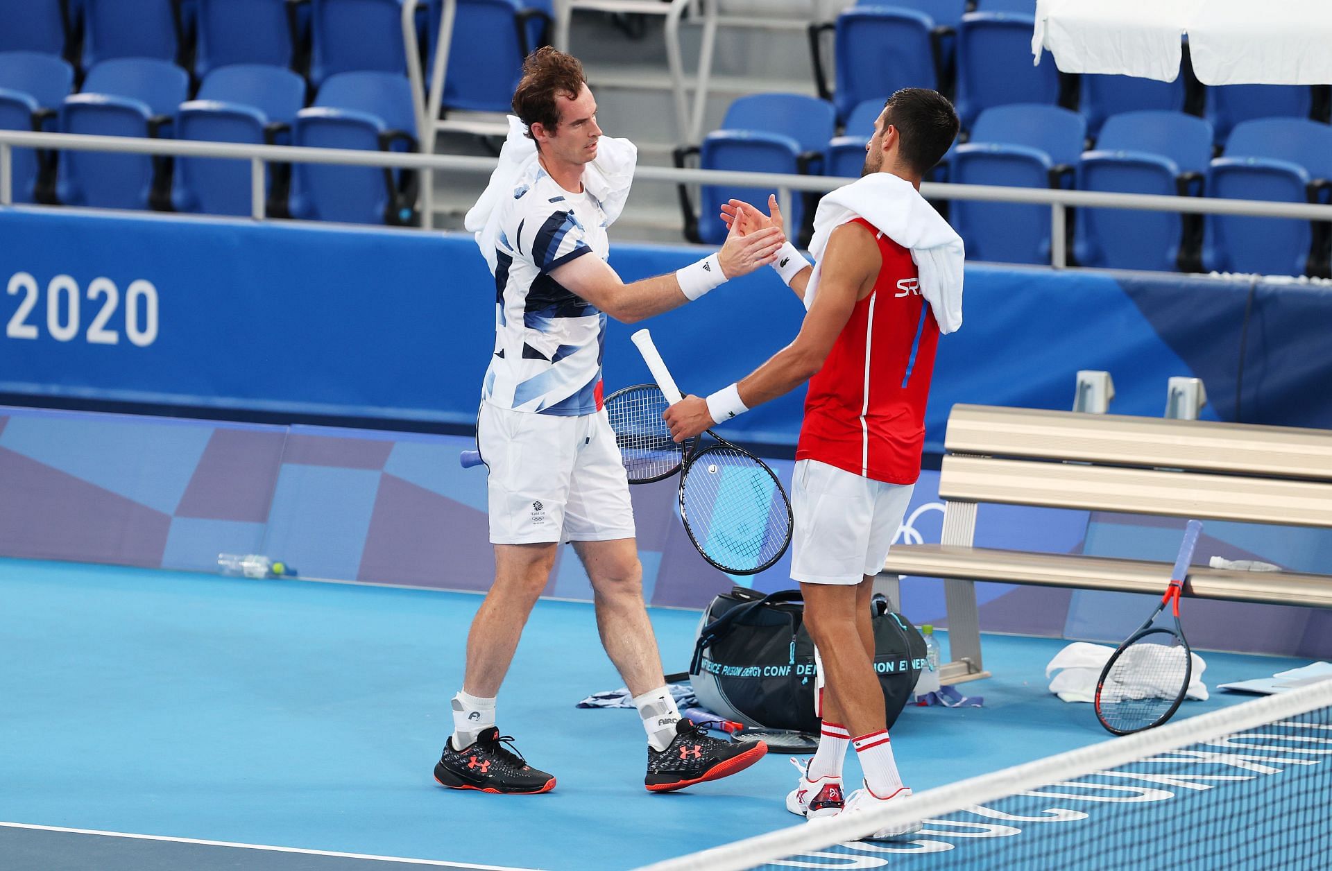 Novak Djokovic (left) greets Andy Murray at the 2020 Tokyo Olympics last summer.