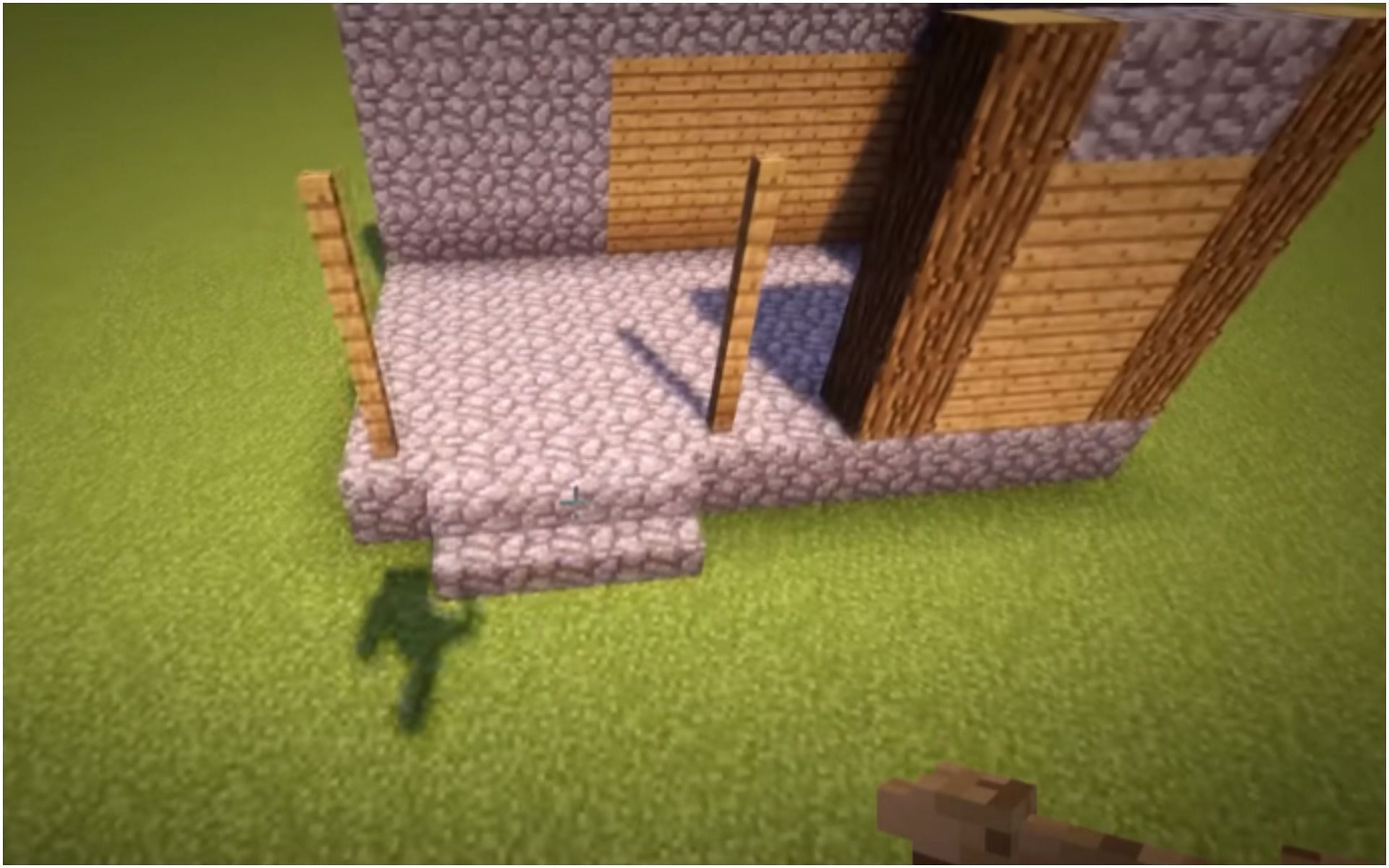 Fences used for the entrance to the house (Image via Minecraft)