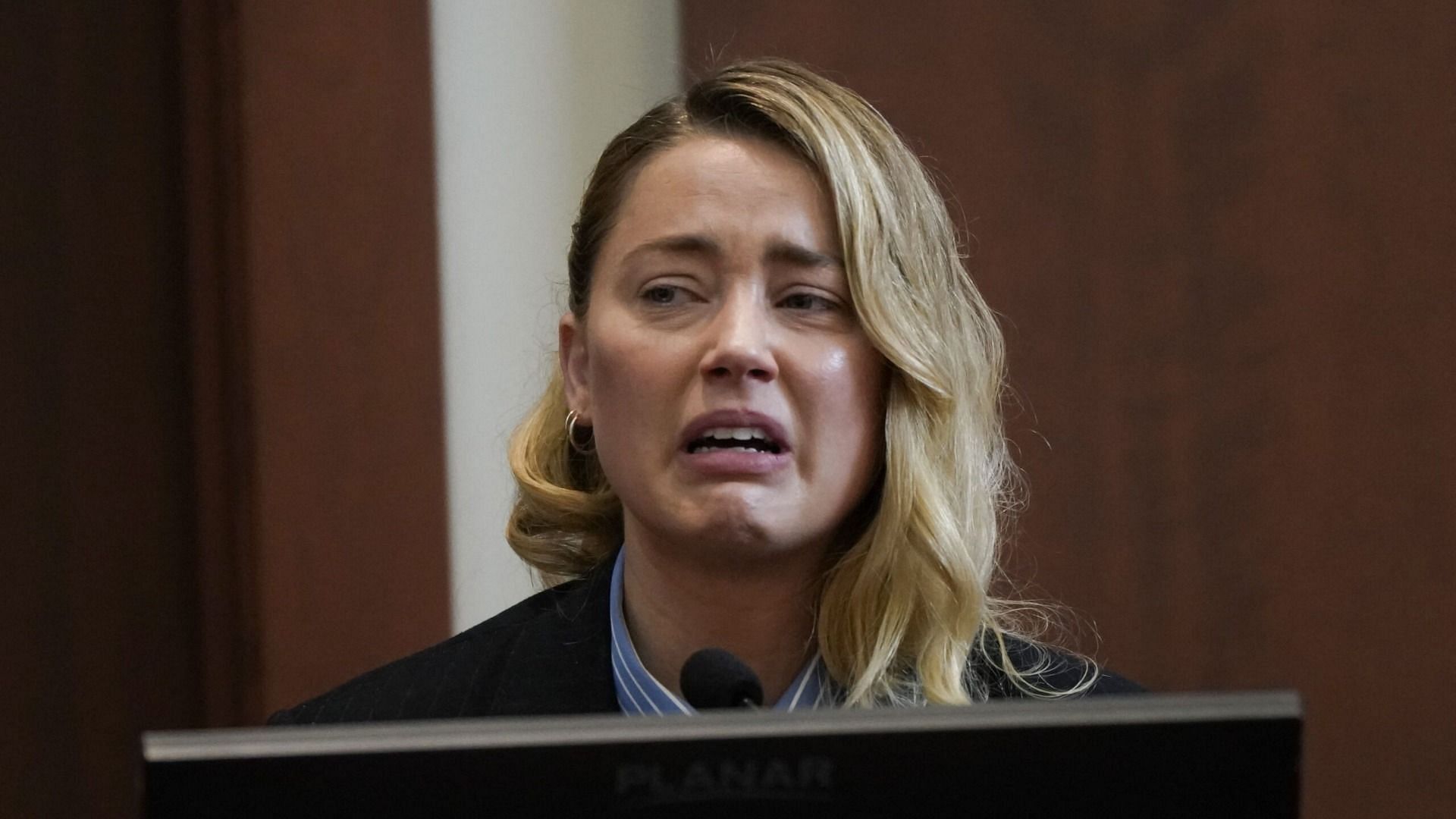Amber Heard stated that she had filed for a temporary restraining order against Johnny Depp because she wanted to &quot;change her locks.&quot; (Image via Getty Images/Elizabeth Frantz)
