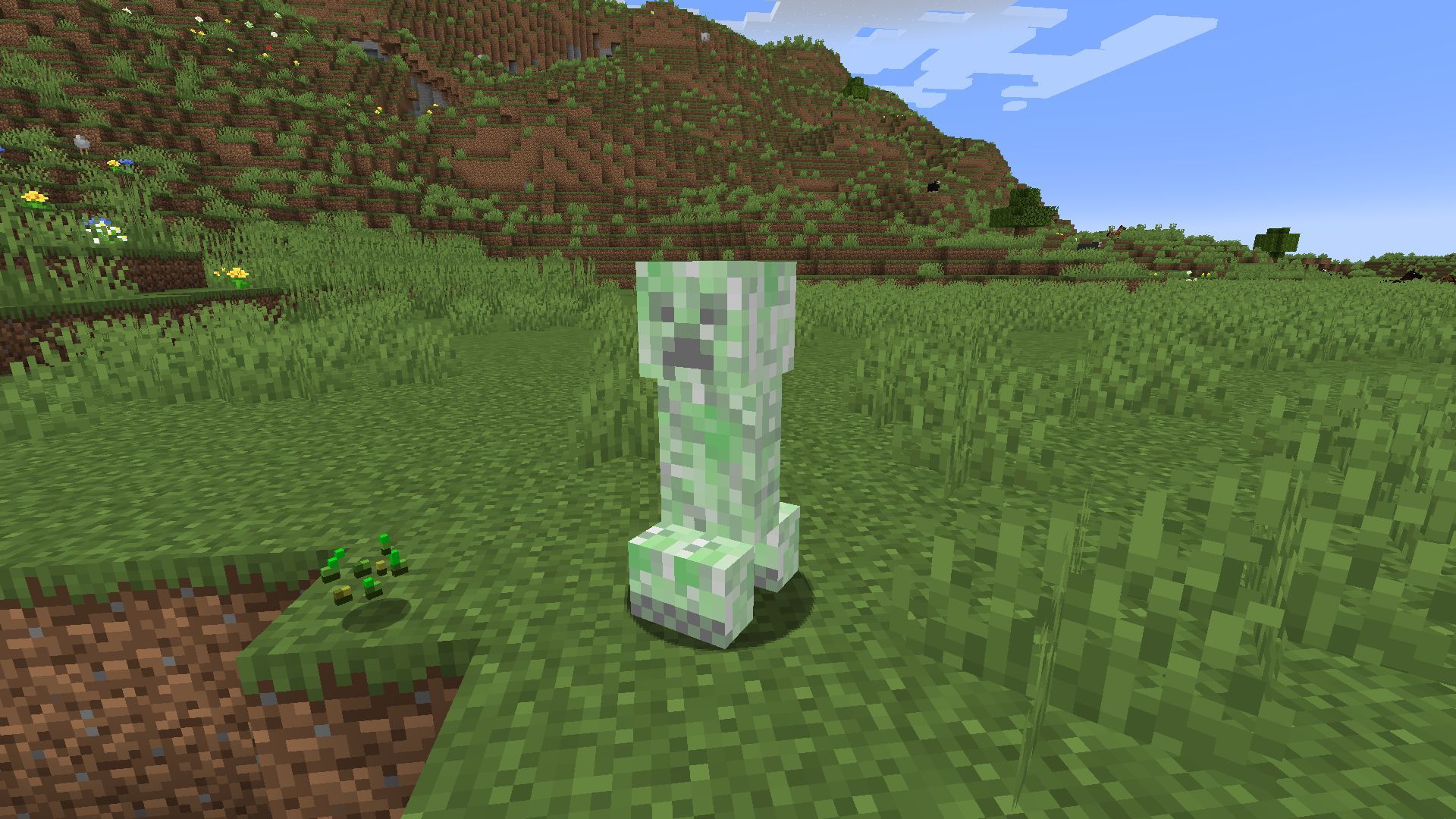 A creeper about to explode (Image via Minecraft)