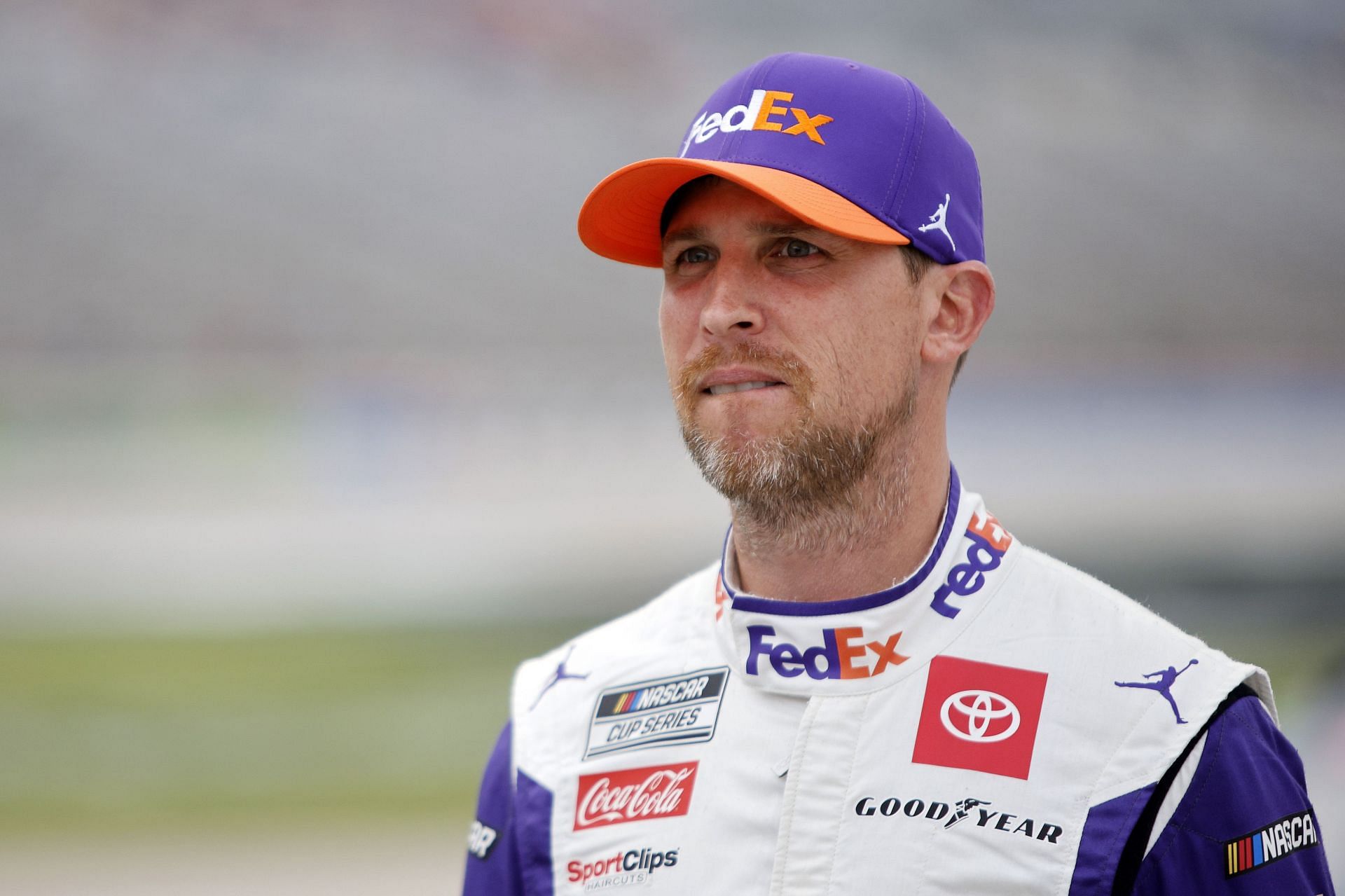 Denny Hamlin looks on during the elimination bracket qualifying for the NASCAR Cup Series All-Star Race at Texas Motor Speedway