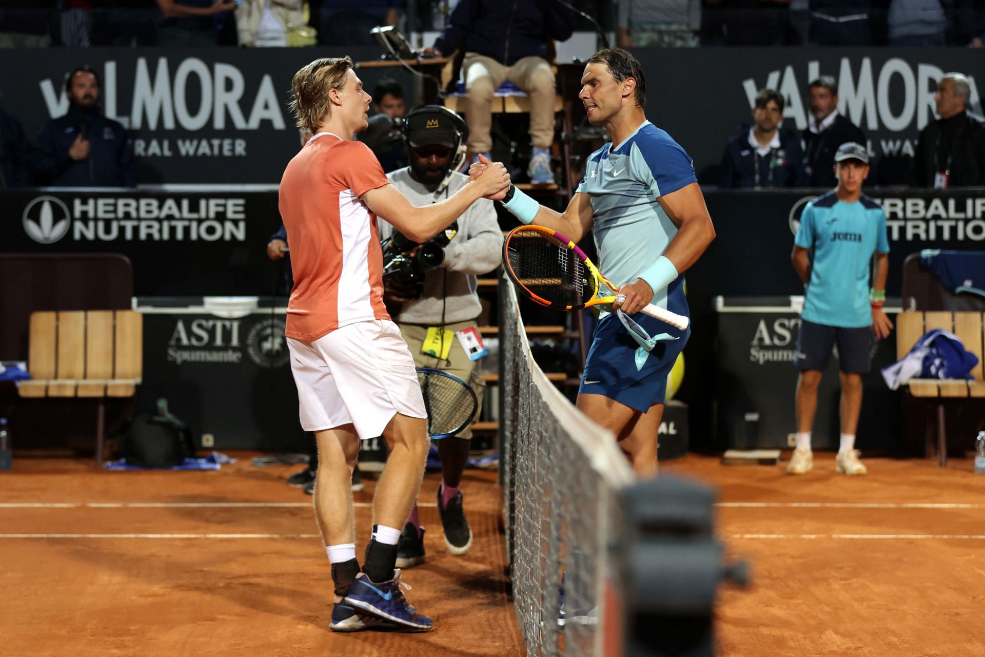 Denis Shapovalov and Rafael Nadal shake hands after their match at the 2022 Italian Open