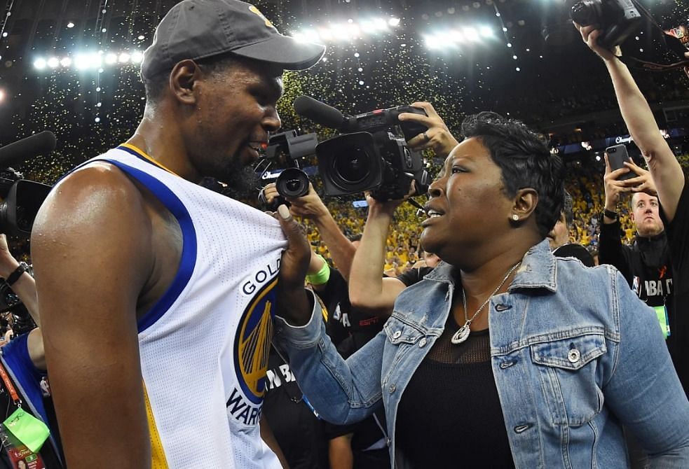 Kevin Durant with his mom after winning the championship [Image Credits: NY Post]