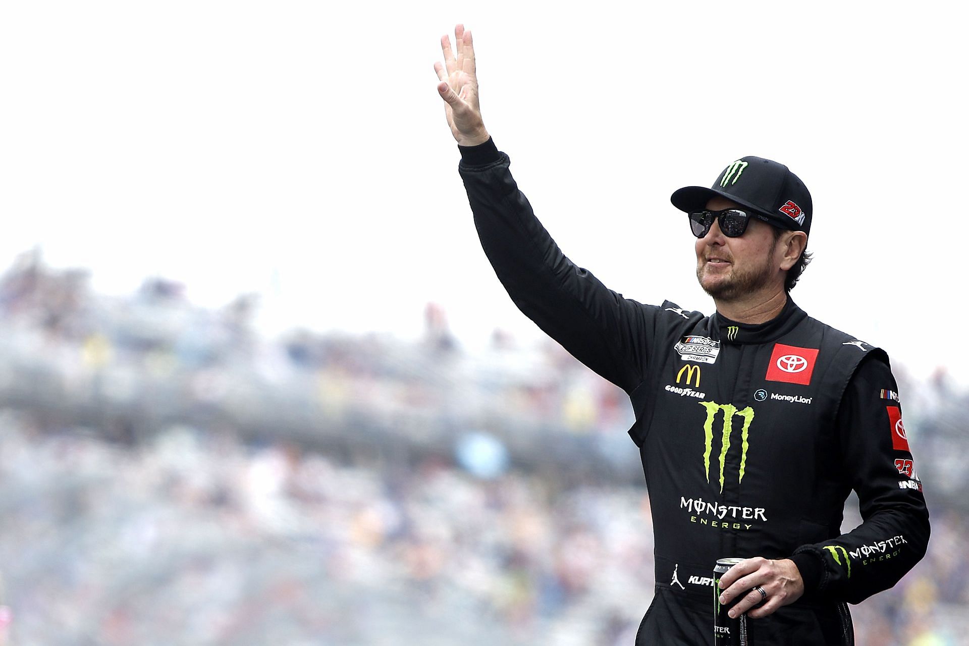 Kurt Busch waves to fans during the driver intros before the NASCAR Cup Series DuraMAX Drydene 400 presented by RelaDyne at Dover Motor Speedway