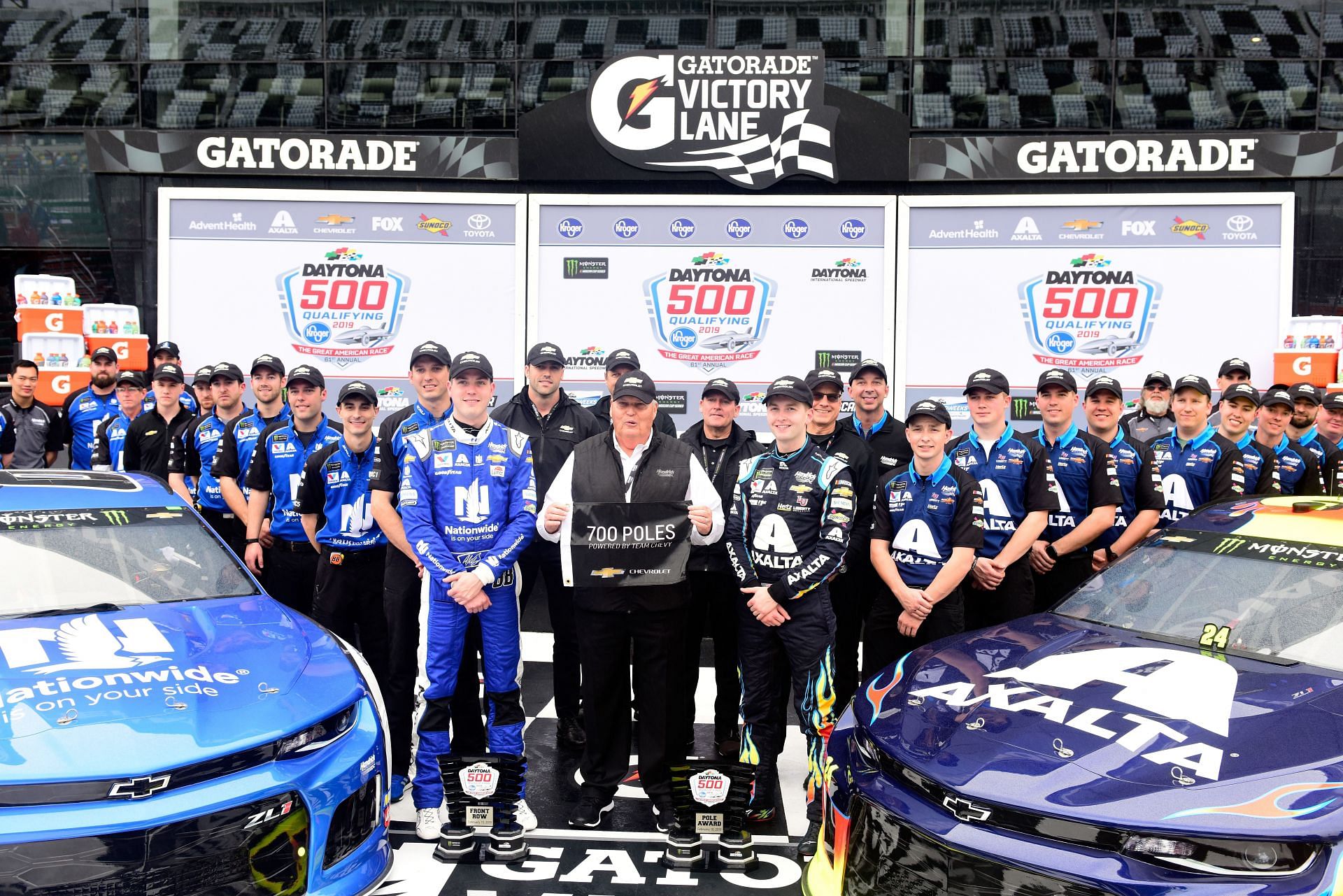 Alex Bowman, team owner Rick Hendrick and William Byron celebrate after winning their 700th pole award during qualifying for the 2019 Monster Energy NASCAR Cup Series 61st Annual Daytona 500 at Daytona International Speedway (Photo by Jared C. Tilton/Getty Images)