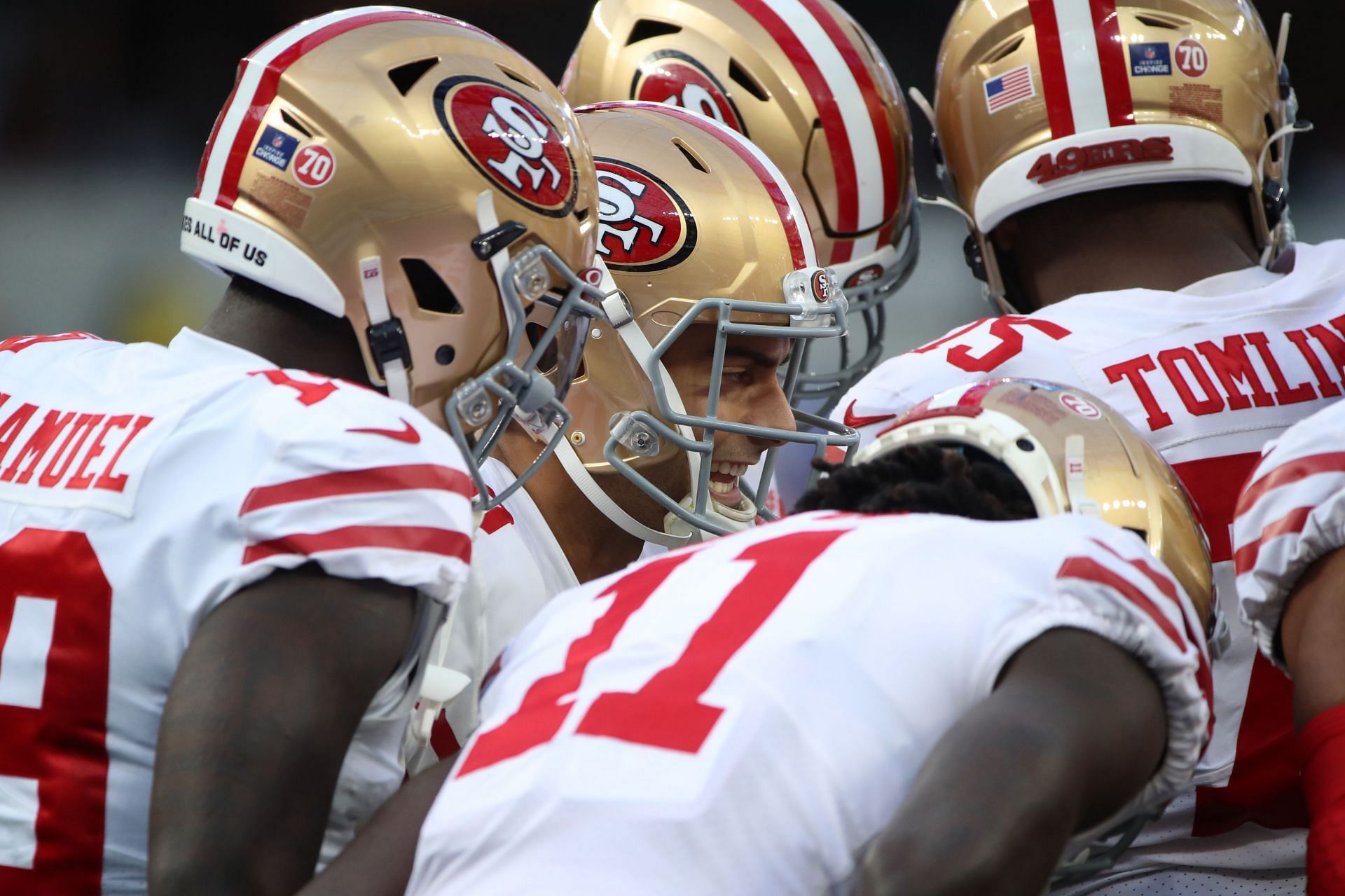 San Francisco 49ers Jimmy Garoppolo and Deebo Samuel huddle up