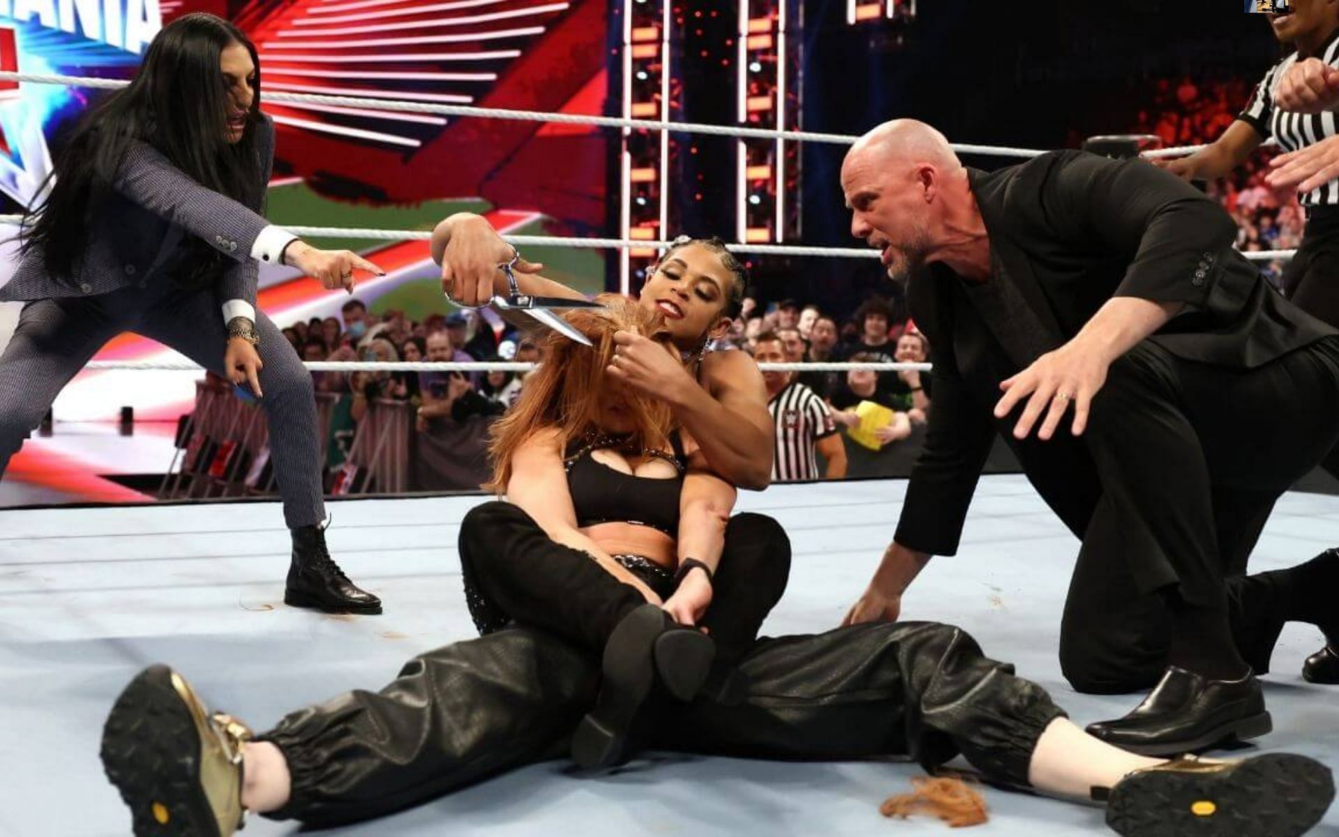 Becky Lynch was the unwilling participant in a haircut at the hands of Bianca Belair