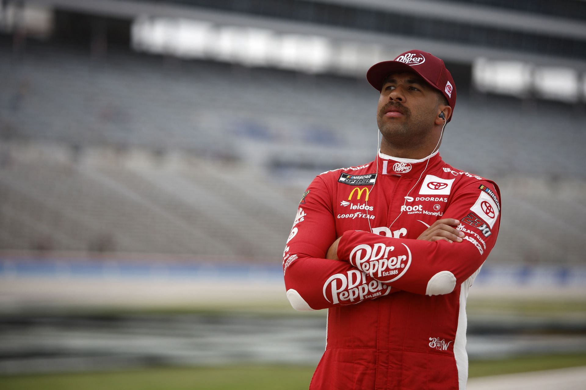 Bubba Wallace Jr. looks on during the elimination bracket qualifying for the NASCAR Cup Series All-Star Race at Texas Motor Speedway (Photo by Sean Gardner/Getty Images)