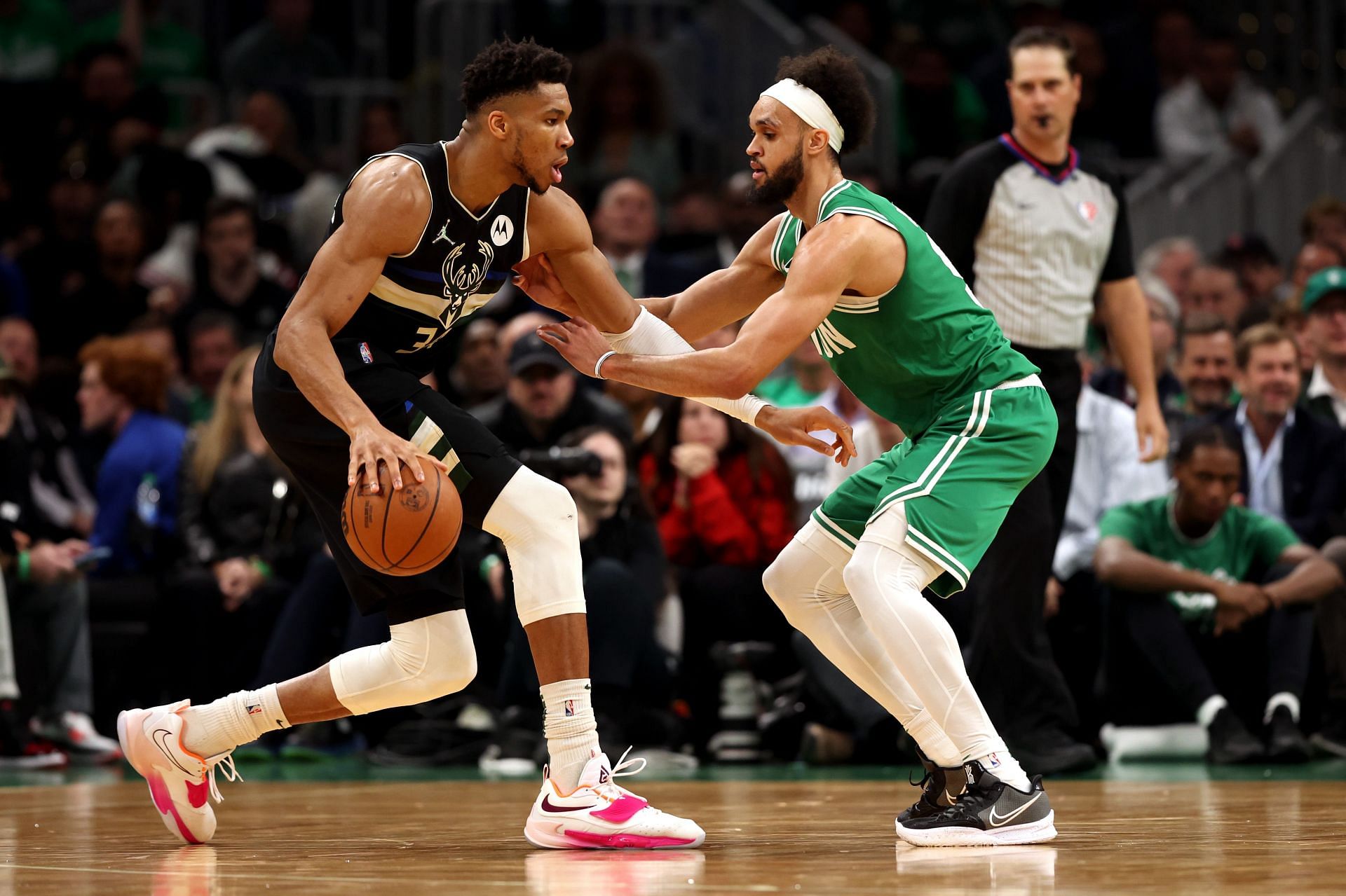 Two crunch-time layups from Giannis Antetokounmpo and Jrue Holiday pushed the Bucks past the Celtics on Saturday.