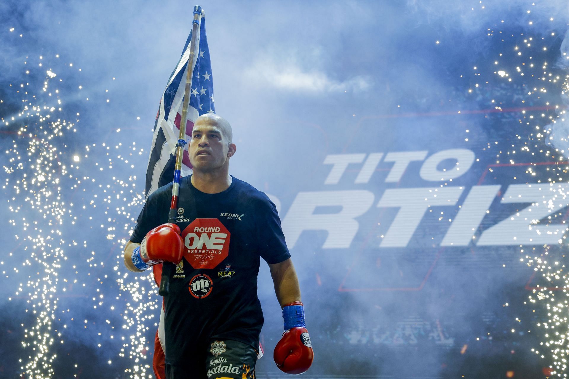 Tito Ortiz walking out to fight Anderson Silva in a boxing match [Image via Getty]