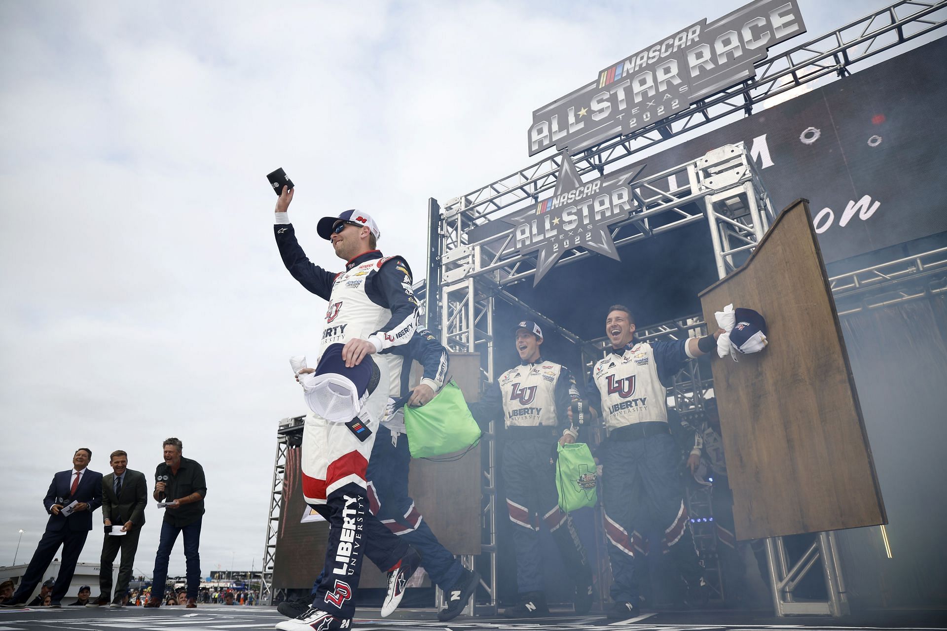 William Byron and crew walk onstage during driver intros prior to the NASCAR Cup Series All-Star Race at Texas Motor Speedway