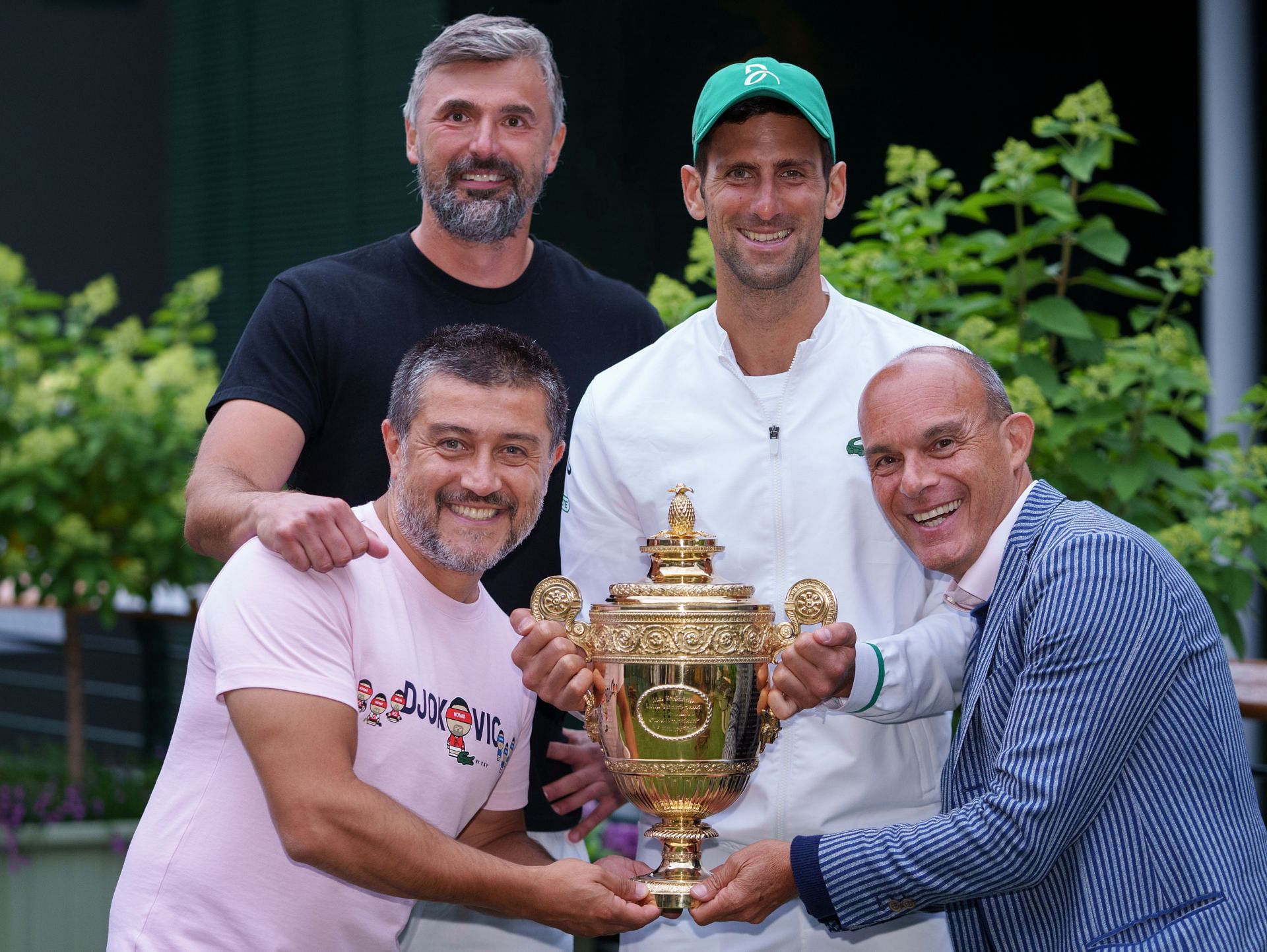 Novak Djokovic with Edoardo Artaldi and coach Goran Ivanisevic at Wimbledon 2021