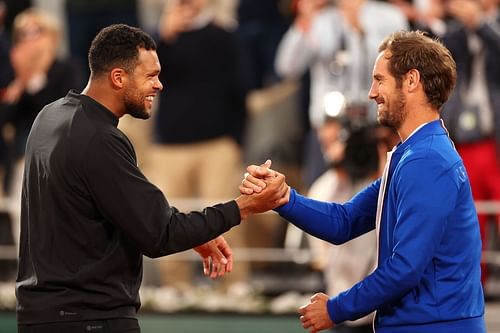 Richard Gasquet congratulates his good friend Jo-Wilfried Tsonga on a successful career