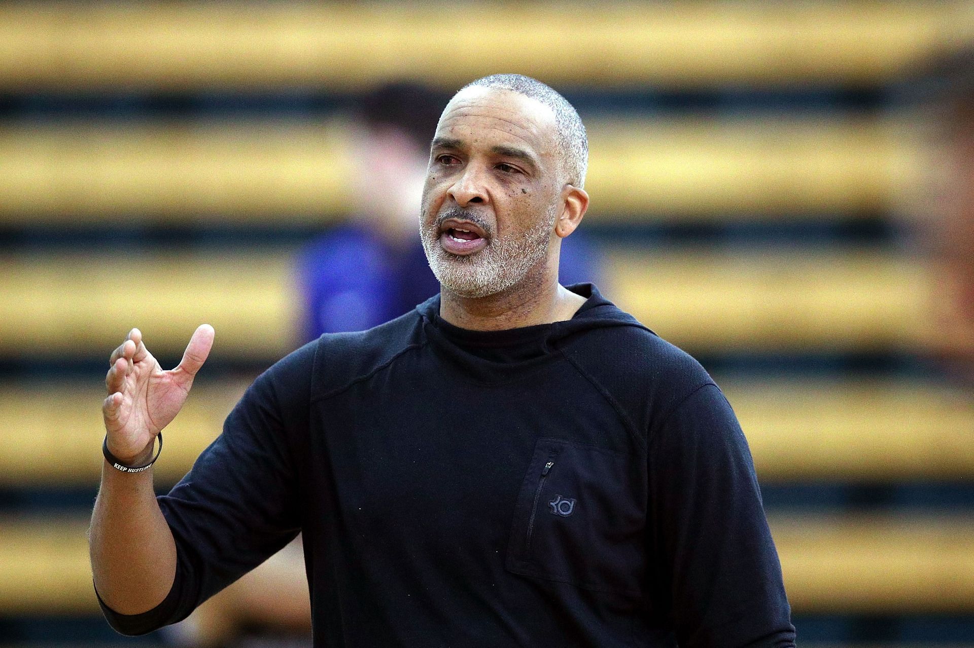 Phil Handy gives instructions during a training session with Melbourne United