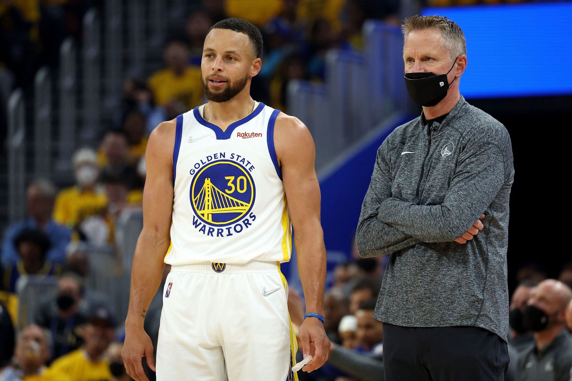 Coach Steve Kerr and Stephen Curry of the Golden State Warriors