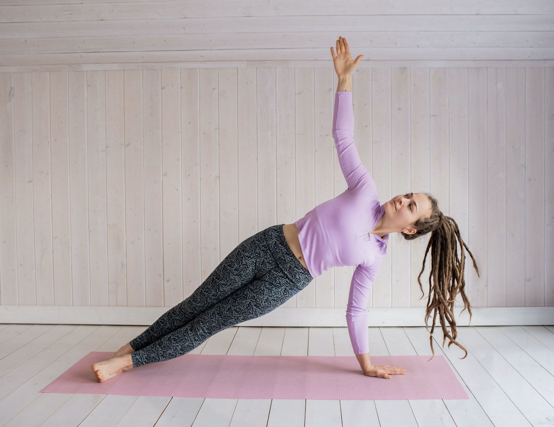 Best standing pilates exercises. (Image via Pexels/Photo by Alexy Almond)