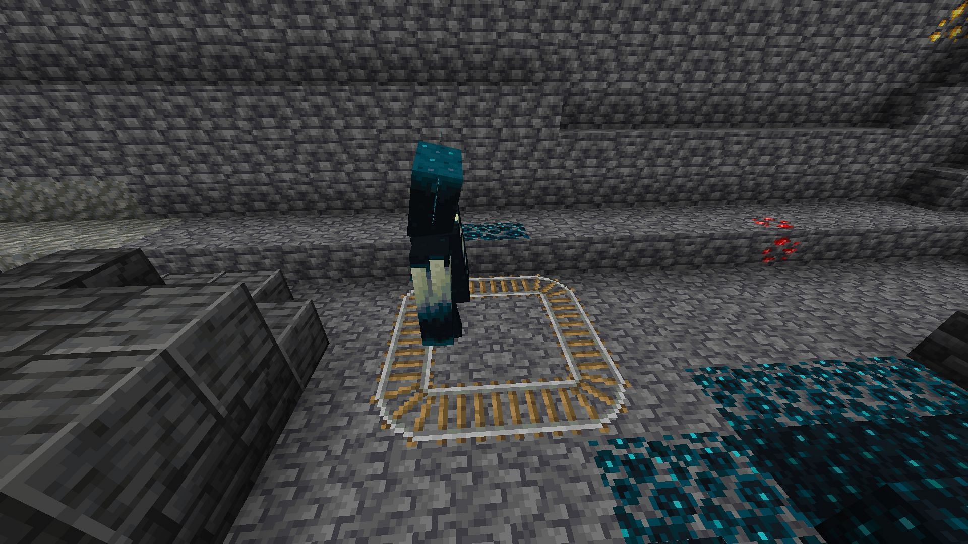 The mob can easily walk over rails (Image via Minecraft 1.19)