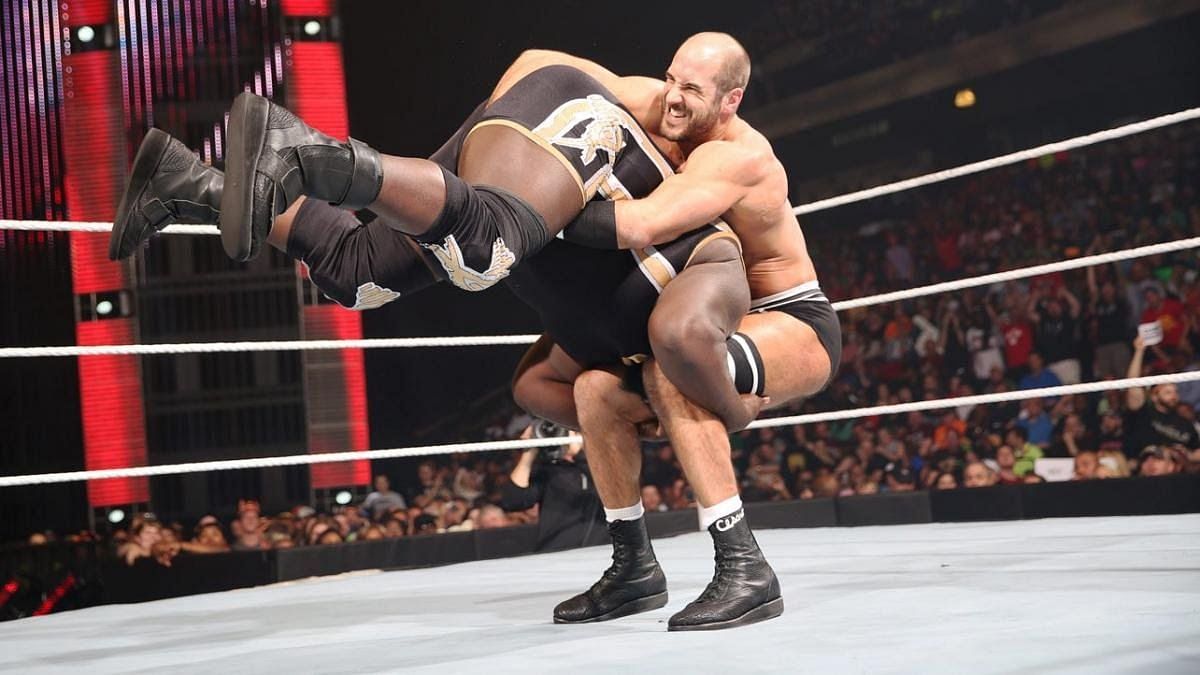 Cesaro performing his finisher on Mark Henry!