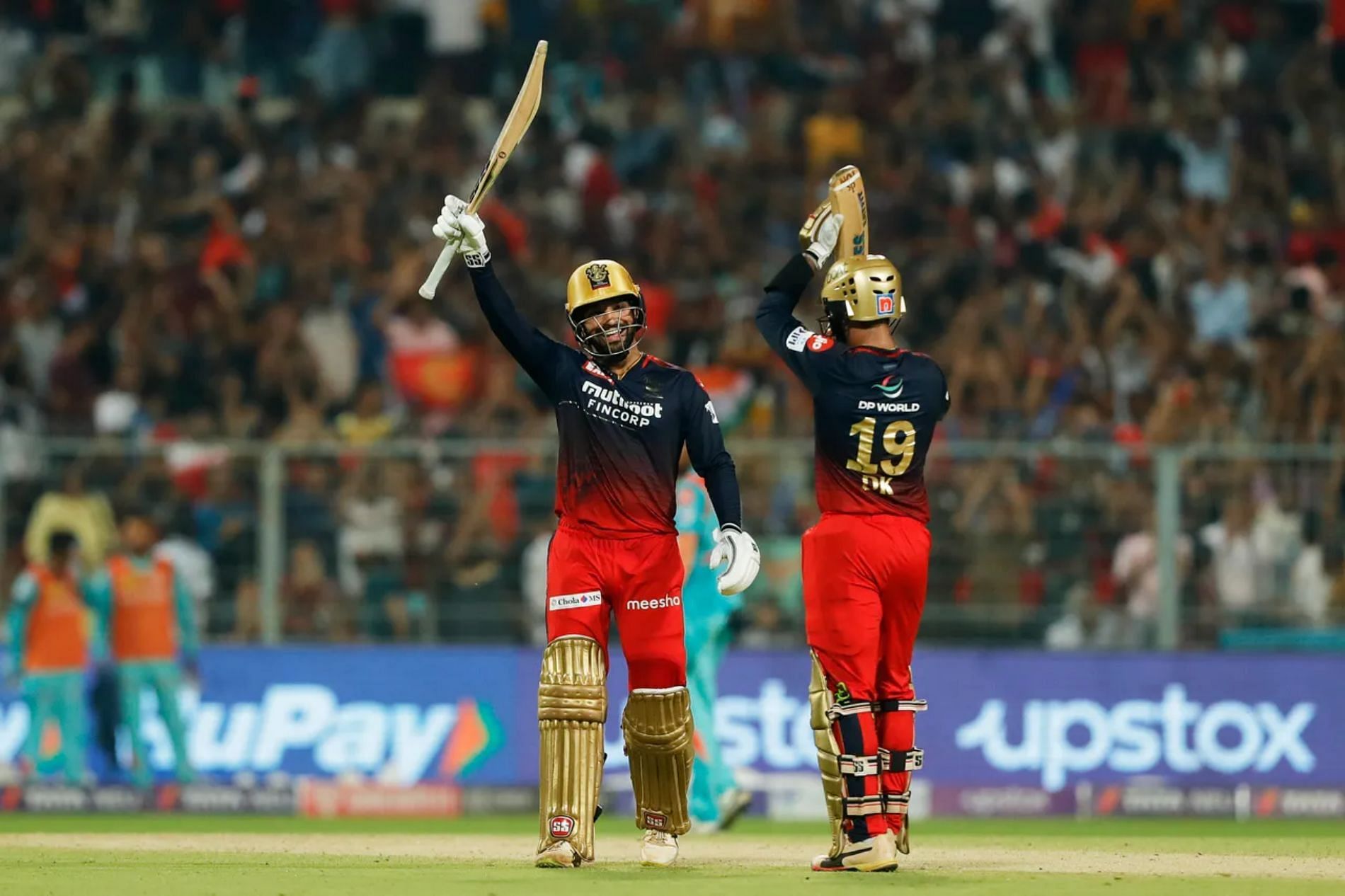 Dinesh Karthik (right) applauds Rajat Patidar&rsquo;s special knock. Pic: IPLT20.COM