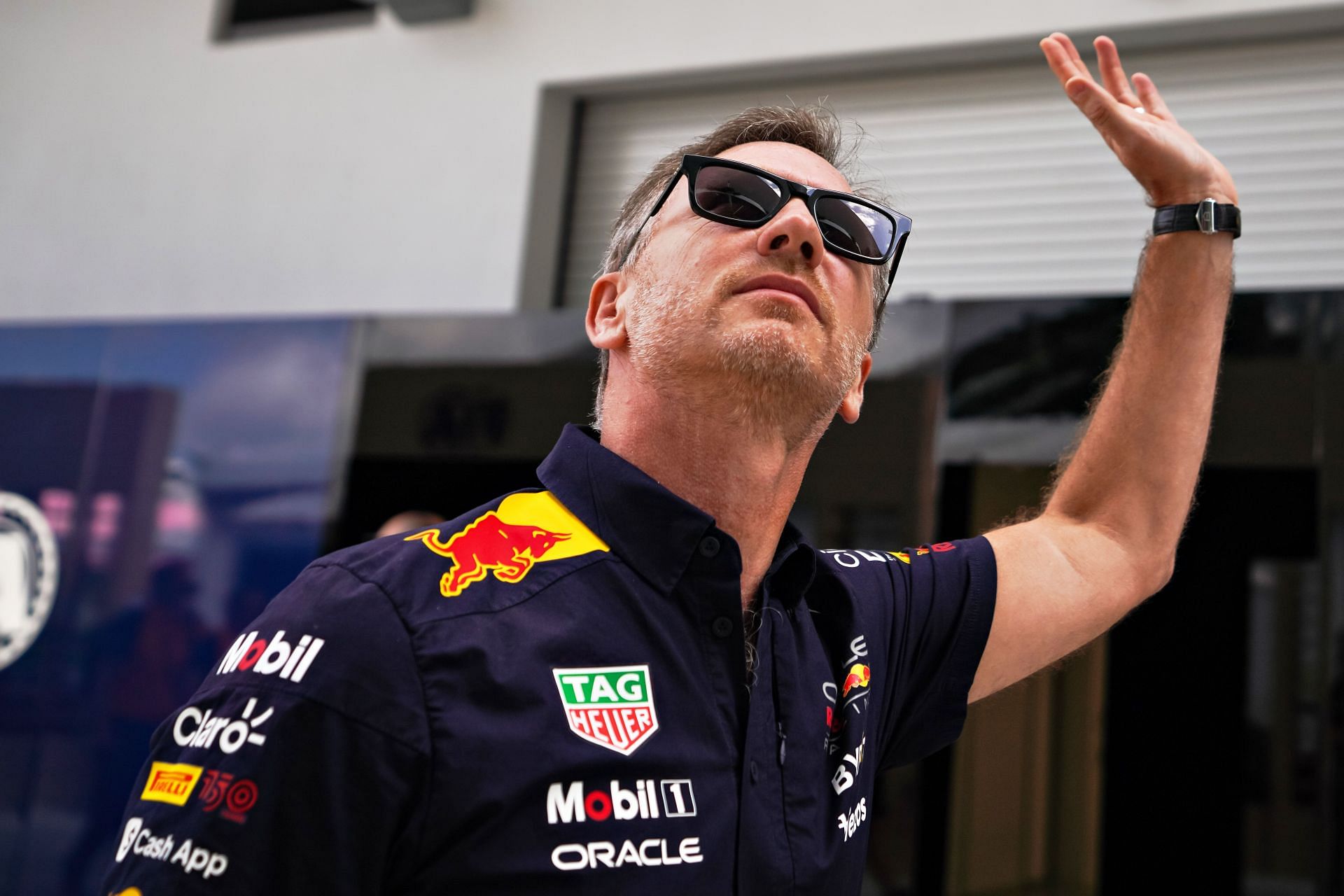 Christian Horner walks in the paddock during the 2022 F1 Miami GP weekend (Photo by Alex Bierens de Haan/Getty Images)