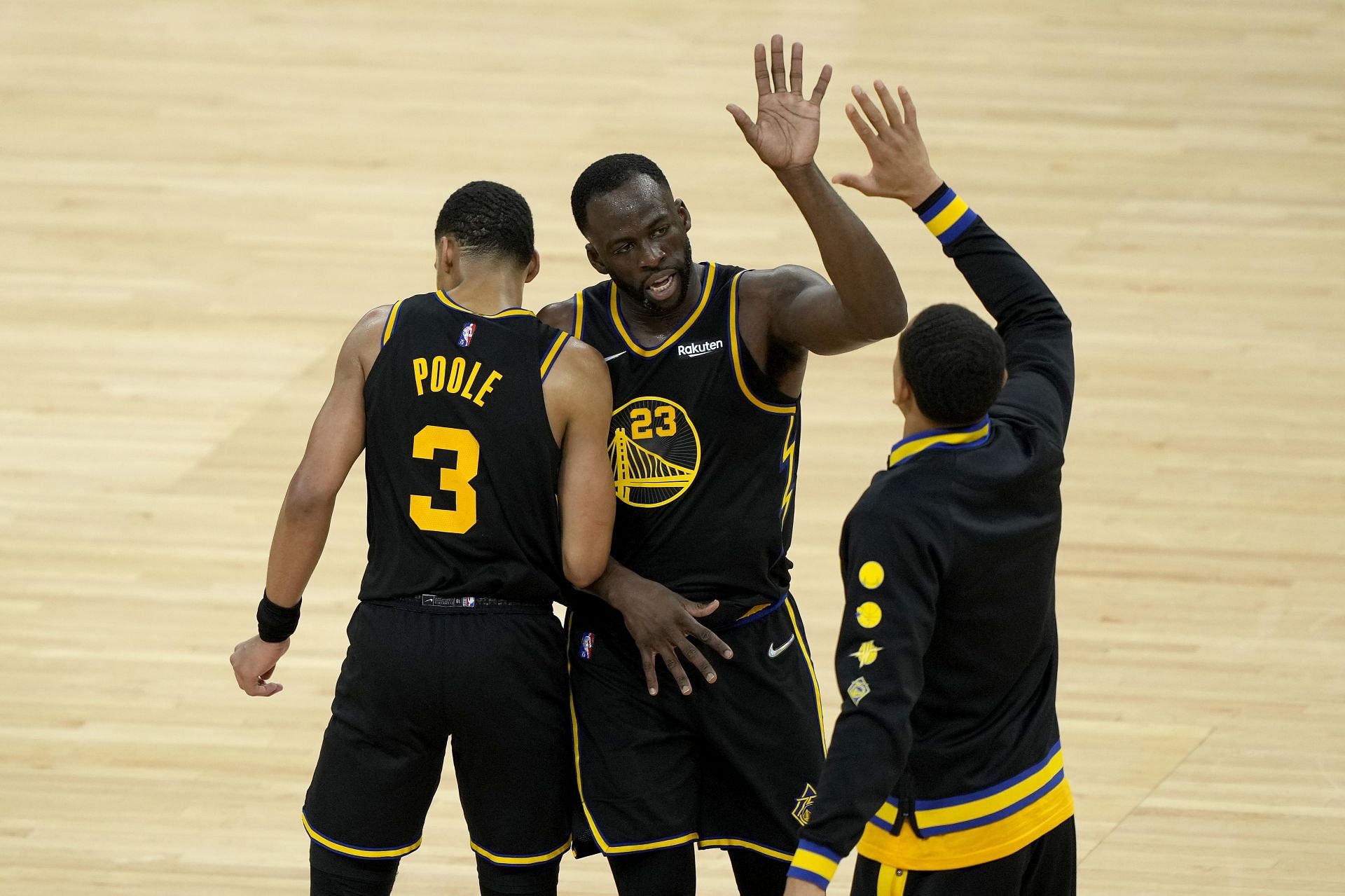 Draymond Green #23 of the Golden State Warriors celebrates with his teammates