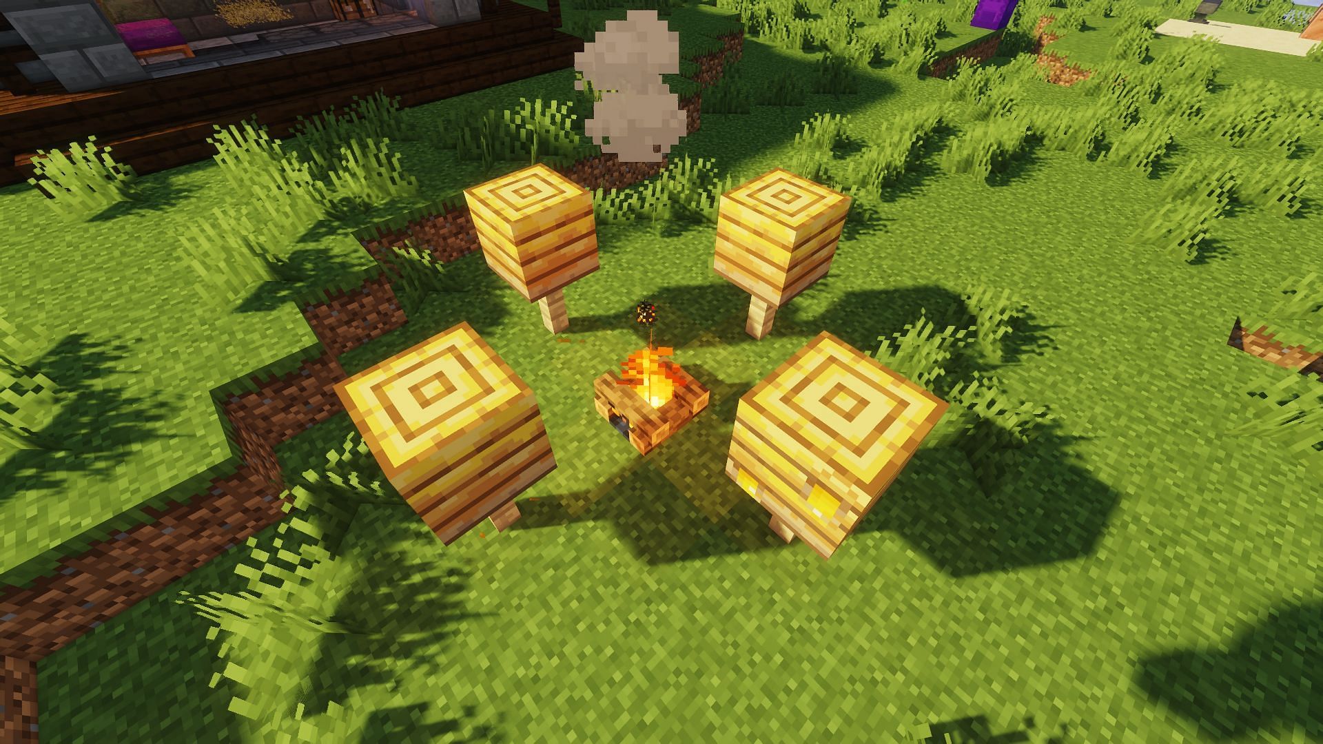 An example of bee nests used in a small honey farm (Image via Minecraft)