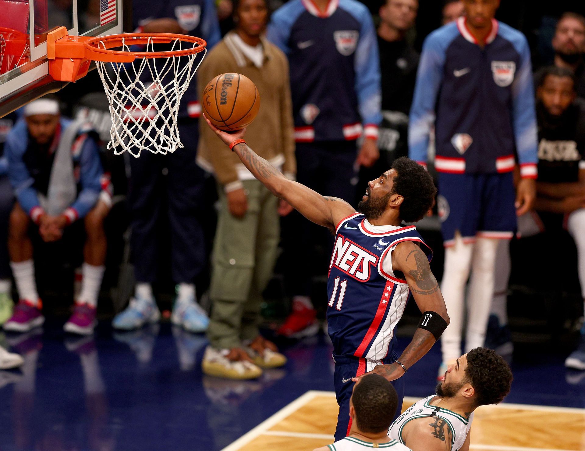 Kyrie Irving #11 of the Brooklyn Nets heads for the net