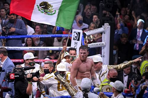 Canelo Alvarez celebrating after knocking out Caleb Plant