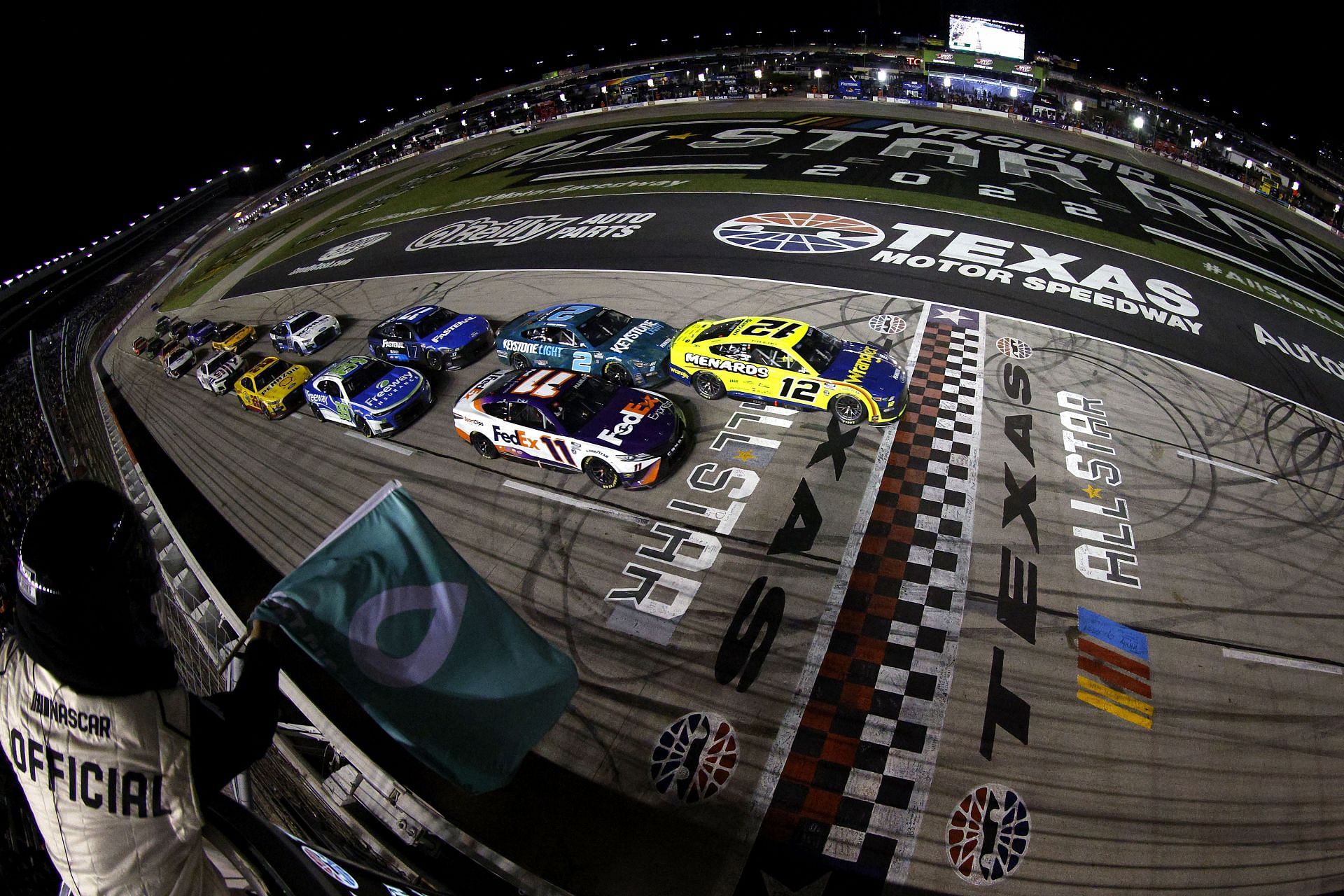Ryan Blaney and Denny Hamlin lead the field to the overtime restart during the 2022 NASCAR Cup Series All-Star Race at Texas Motor Speedway in Fort Worth, Texas. (Photo by Sean Gardner/Getty Images)