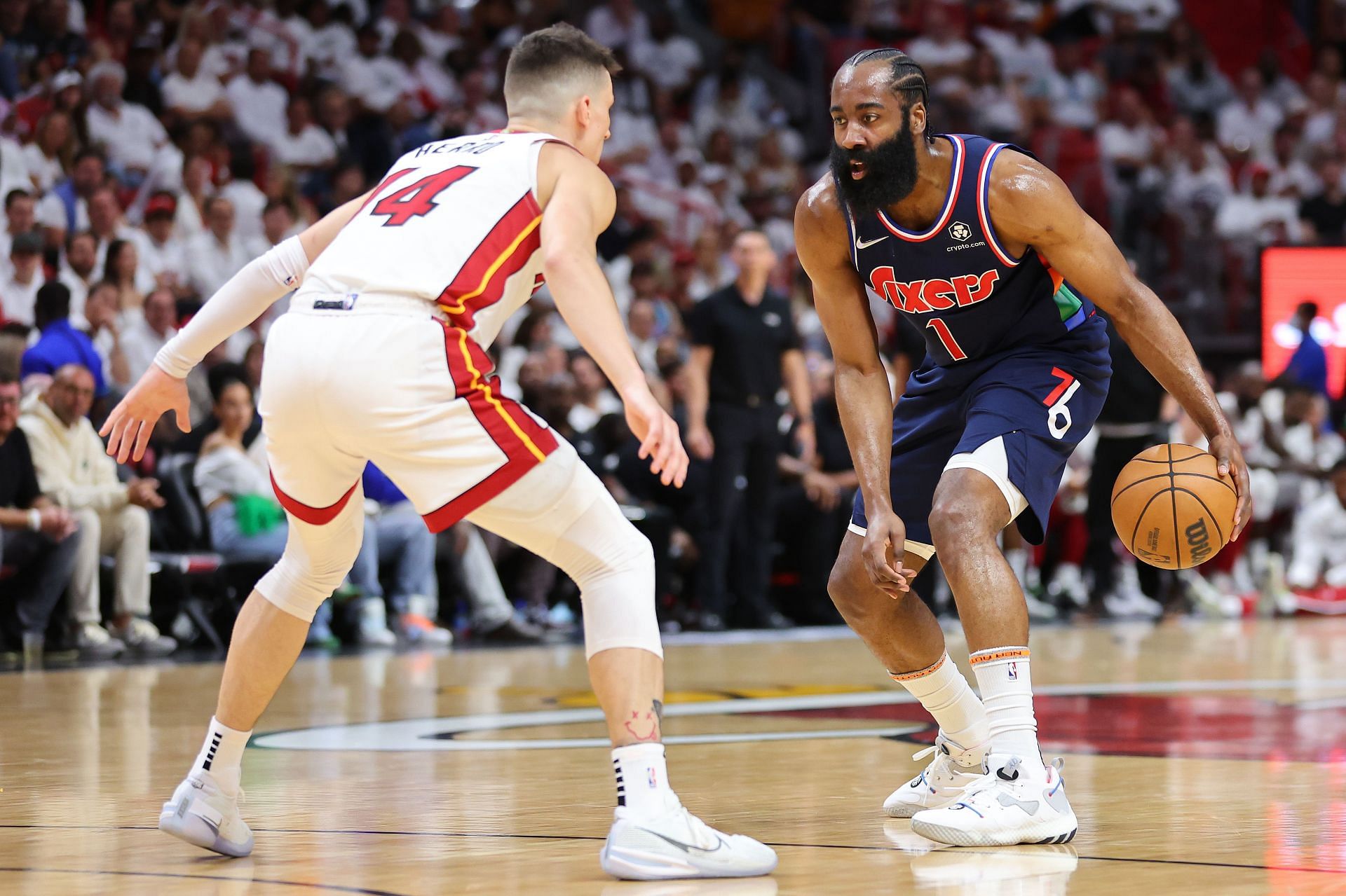 James Harden of the Philadelphia 76ers defended by Tyler Herro of the Miami Heat in Game 1